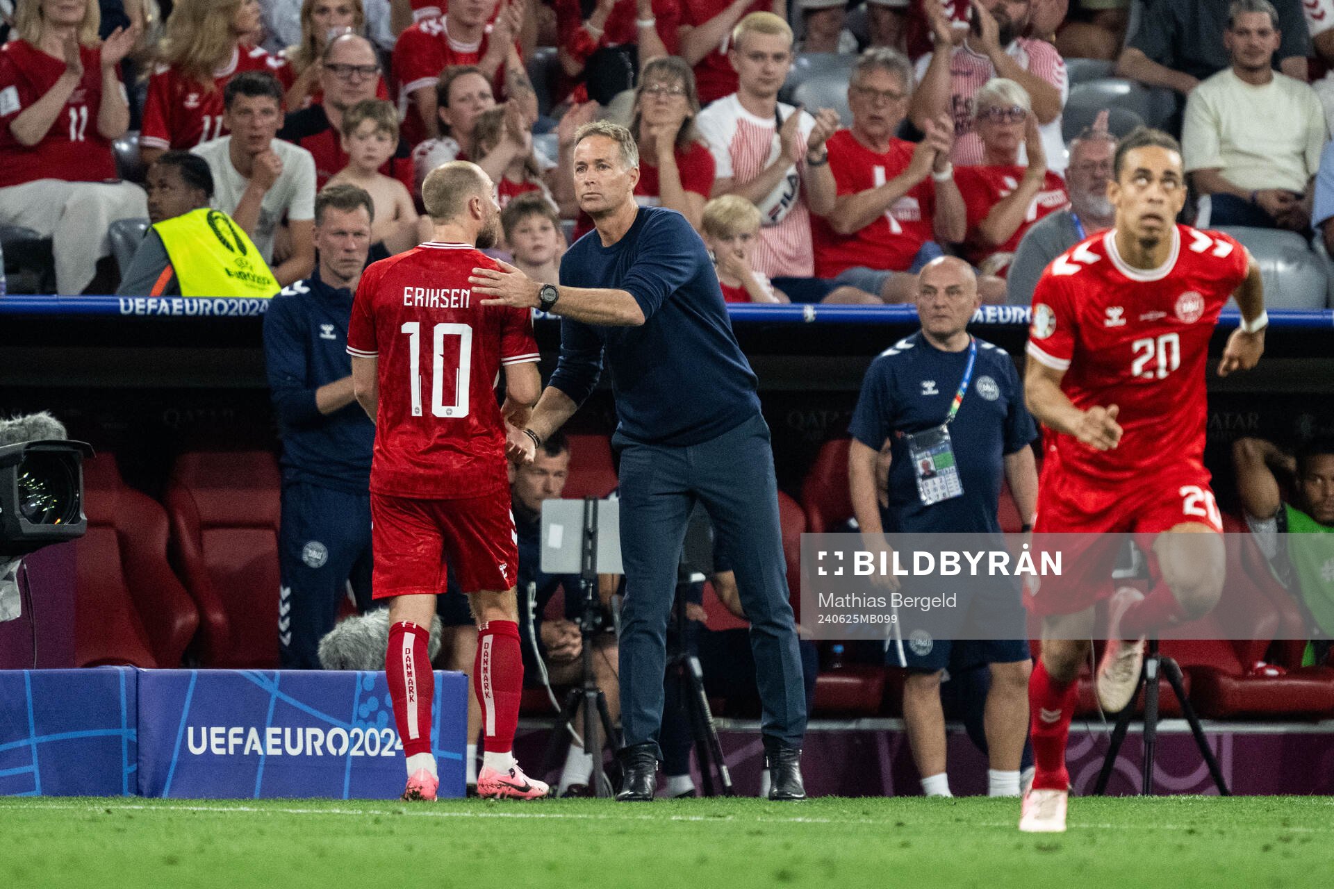 Christian Eriksen and head coach Kasper Hjulmand of Denmark