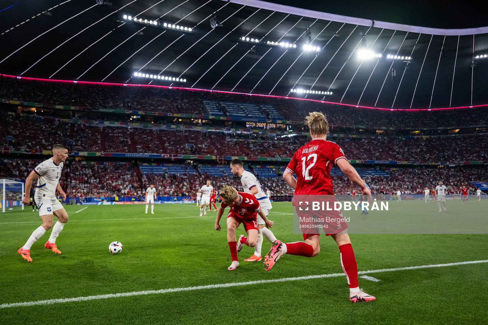 Nikola Milenkovic and Milos Veljkovic of Serbia compete for the ball with Victor Kristiansen and Kasper Dolberg of Denmark during the UEFA Euro 2024 Football Championship match between Denmark and Serbia on June 25, 2024 in Munich.