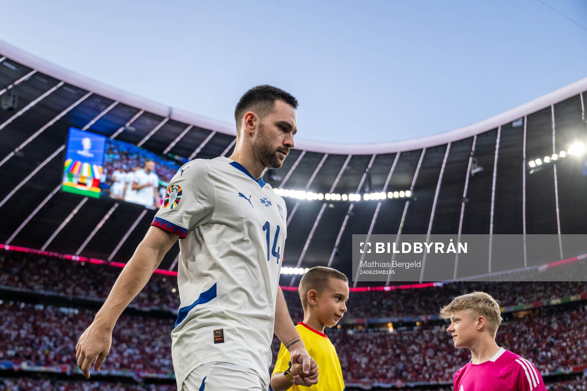 Andrija Zivkovic of Serbia enters the pitch ahead of the UEFA Euro 2024 Football Championship match between Denmark and Serbia on June 25, 2024 in Munich.
