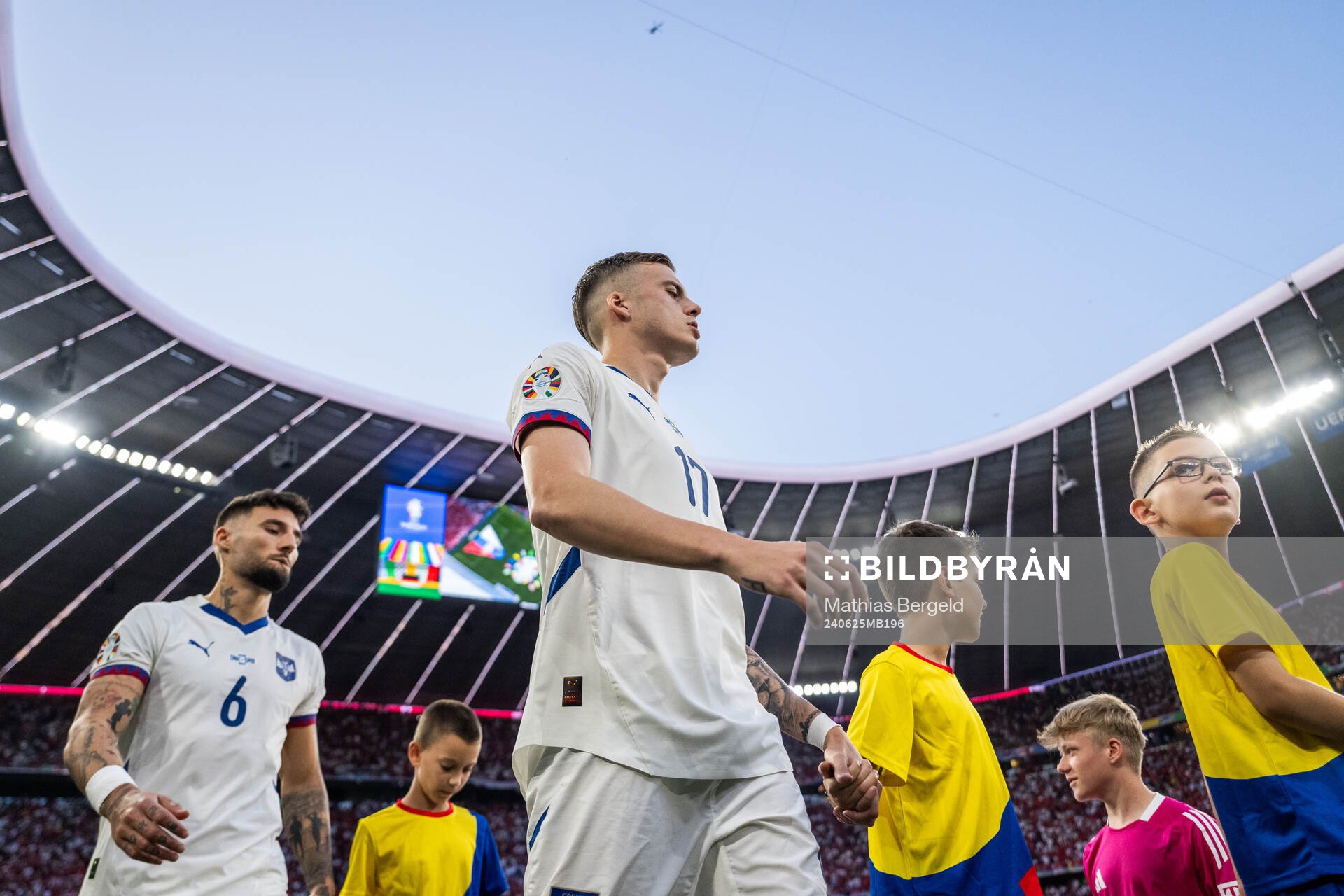 Ivan Ilic of Serbia enters the pitch