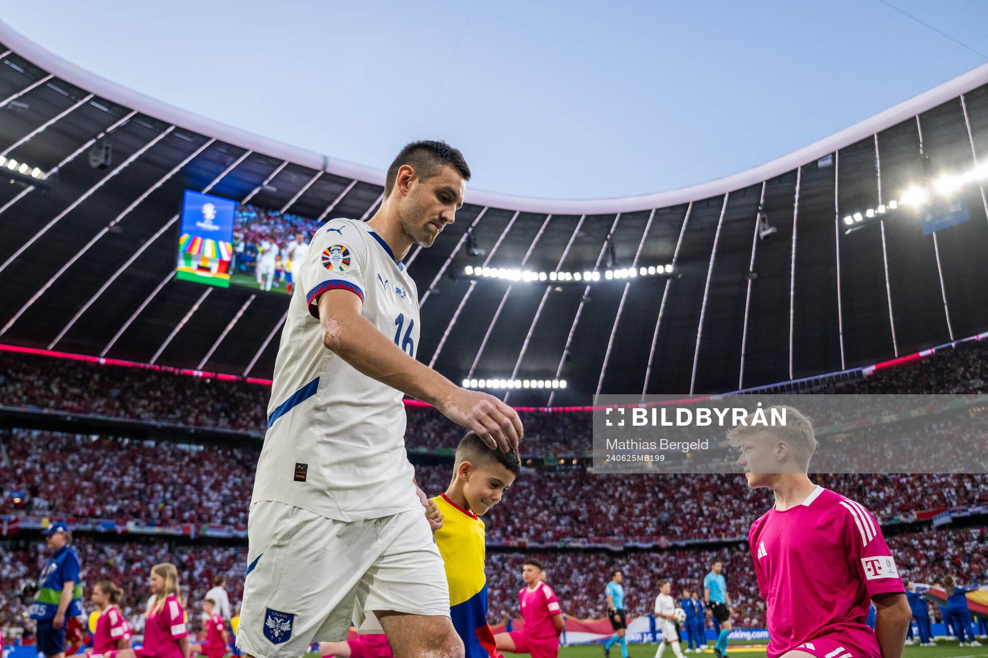 Srdan Mijailovic of Serbia enters the pitch