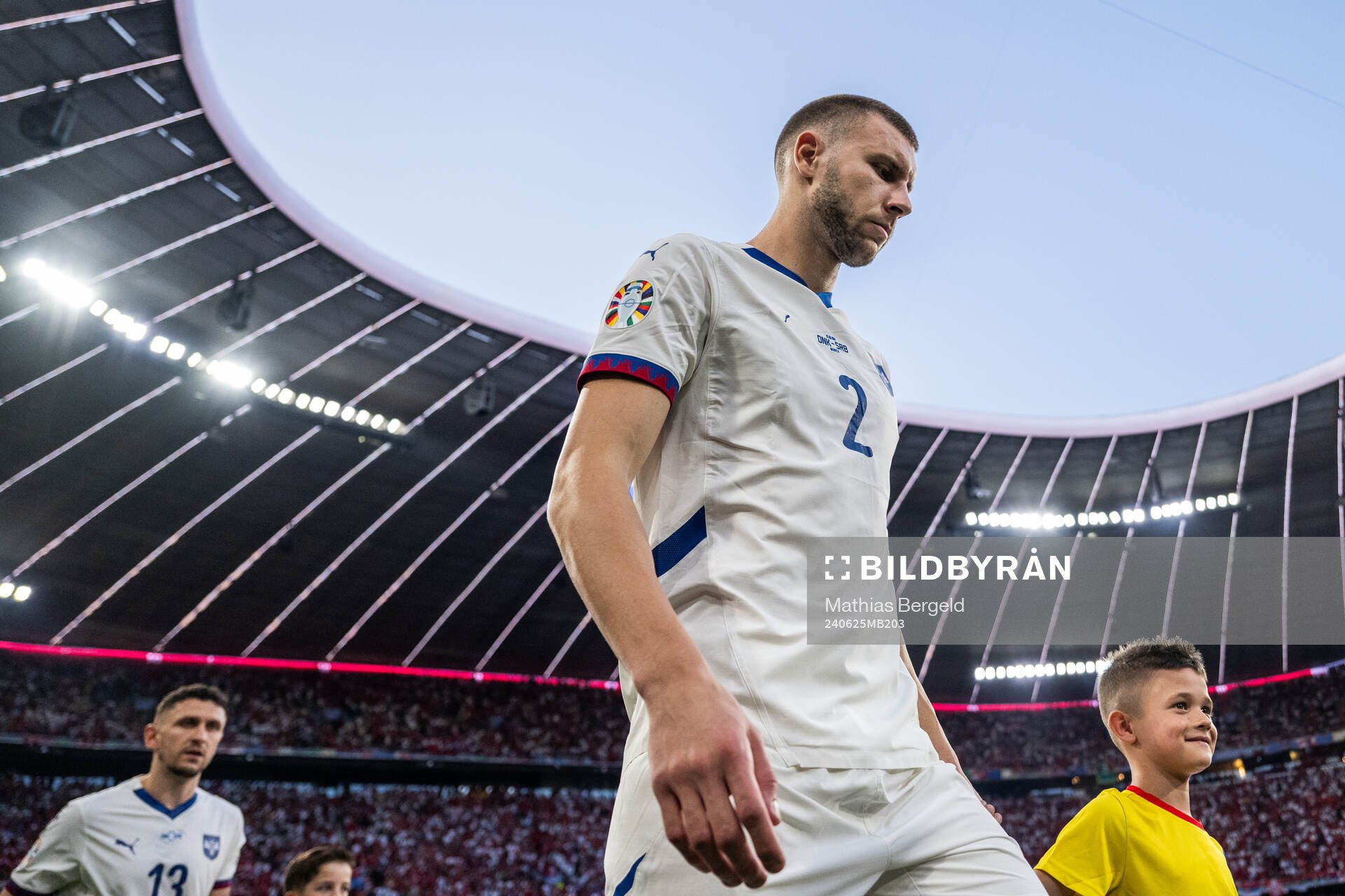 Strahinja Pavlovic of Serbia enters the pitch