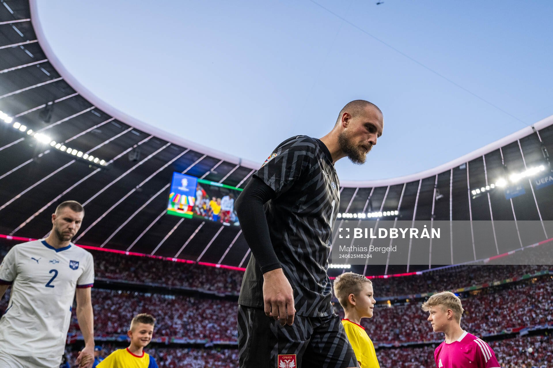 Goalkeeper Predrag Rajkovic of Serbia enters the pitch