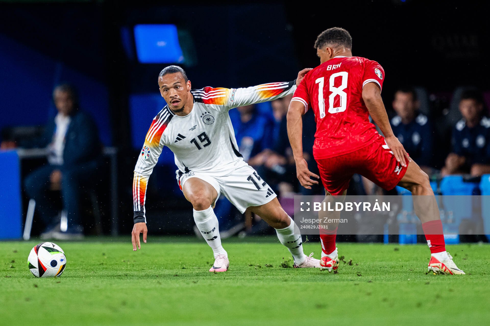 Leroy Sane of Germany and Alexander Bah of Denmark