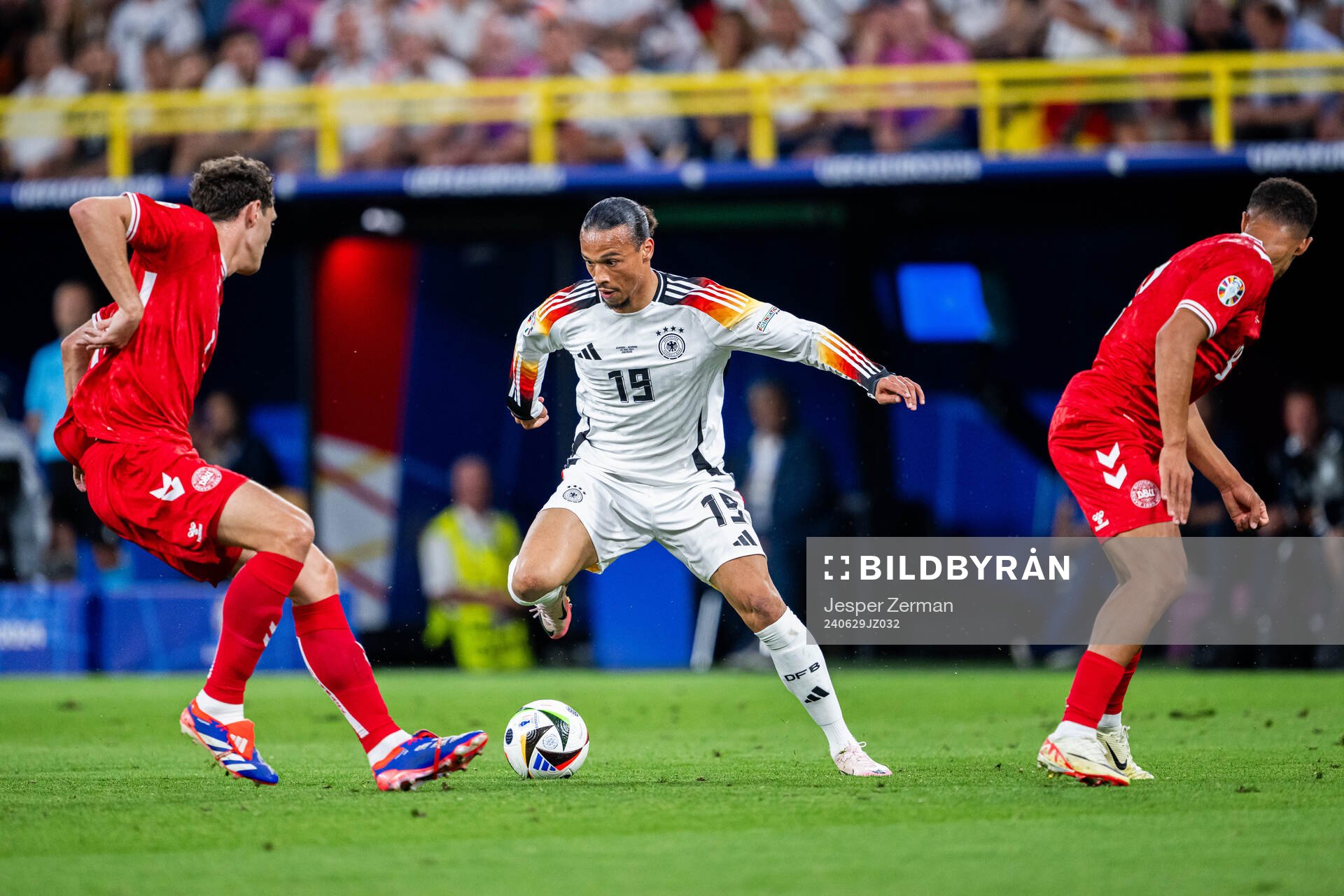 Leroy Sane of Germany and Andreas Christensen and Alexander