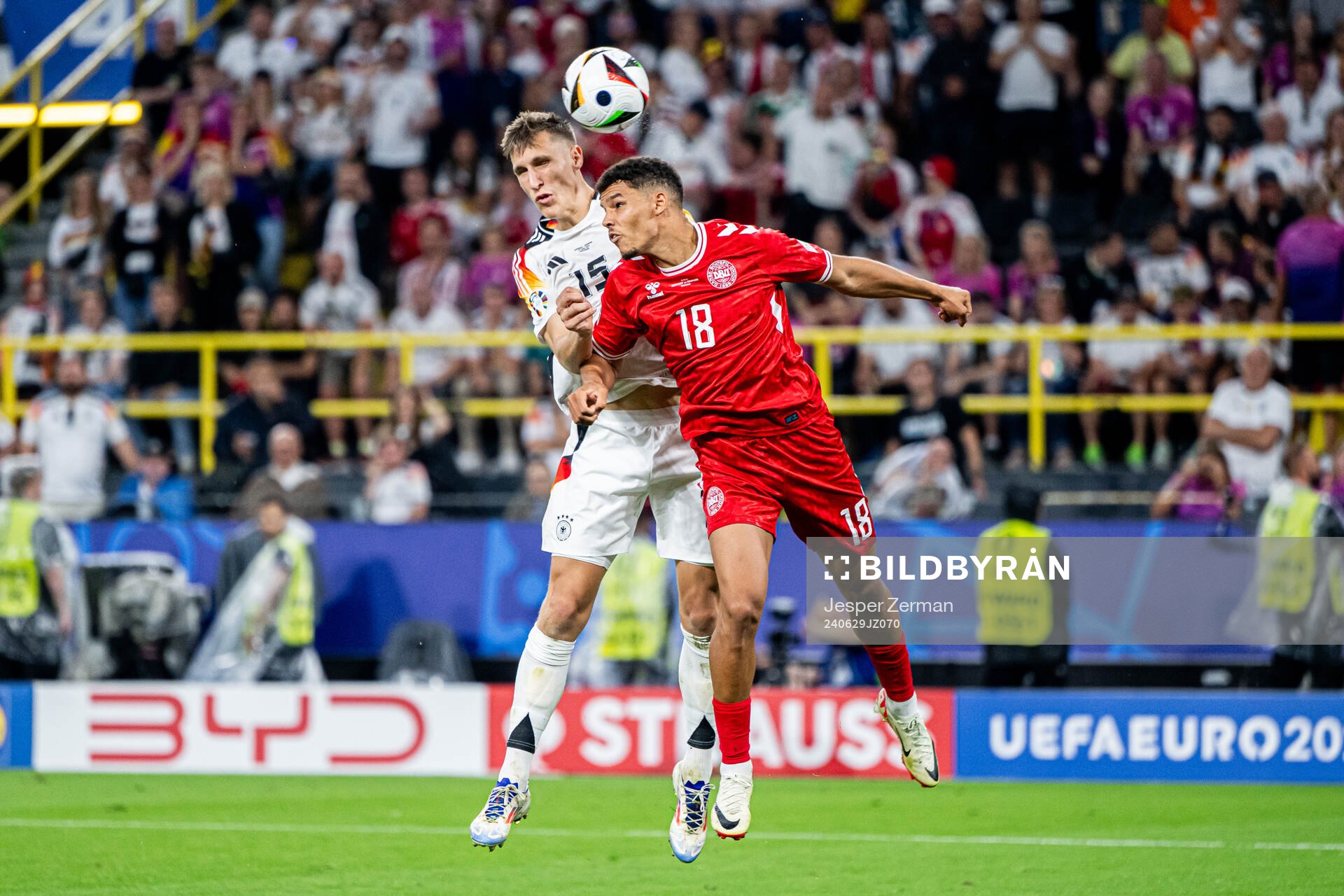 Nico Schlotterbeck of Germany and Alexander Bah of Denmark