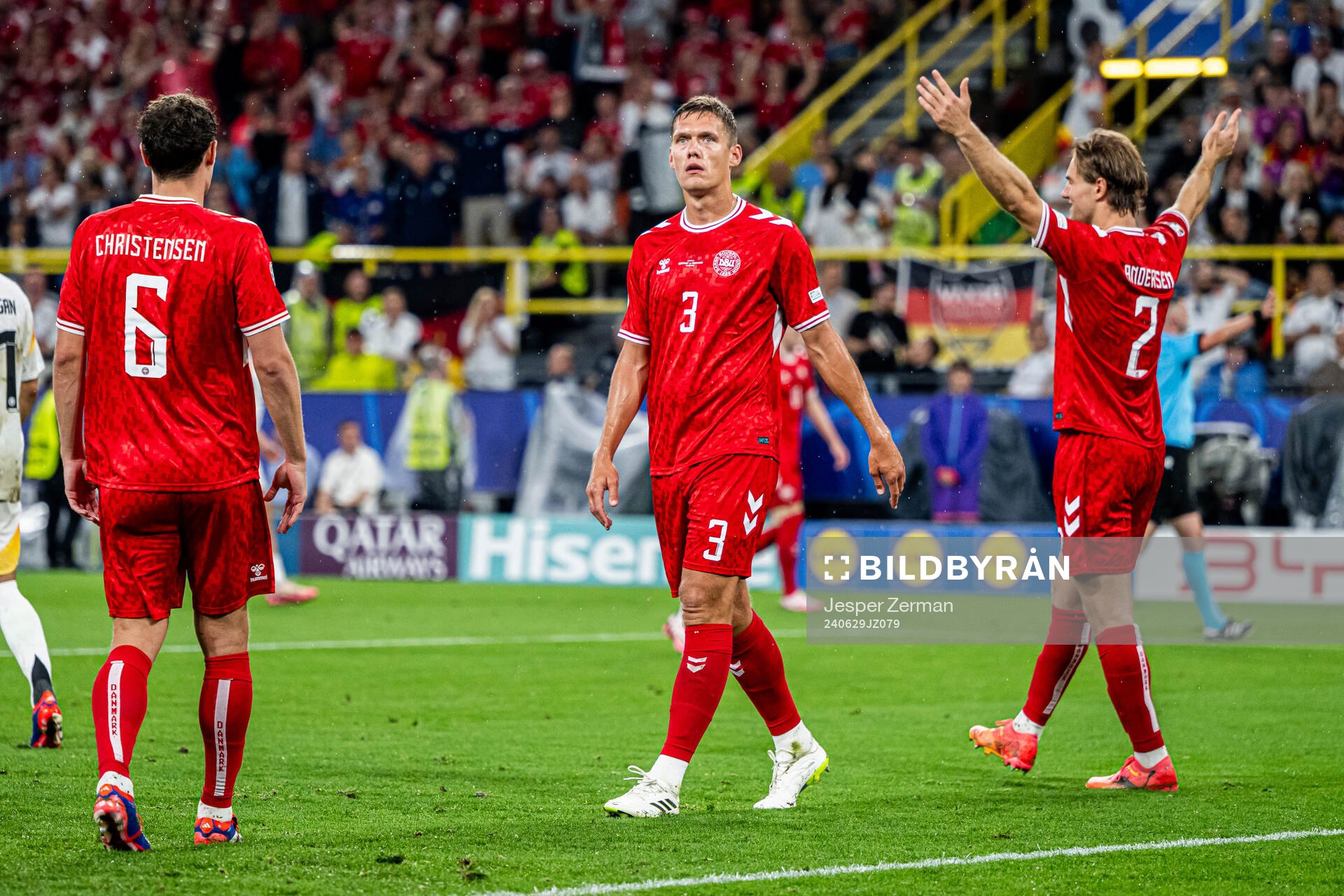 Jannik Vestergaard and Joachim Andersen of Denmark reacts