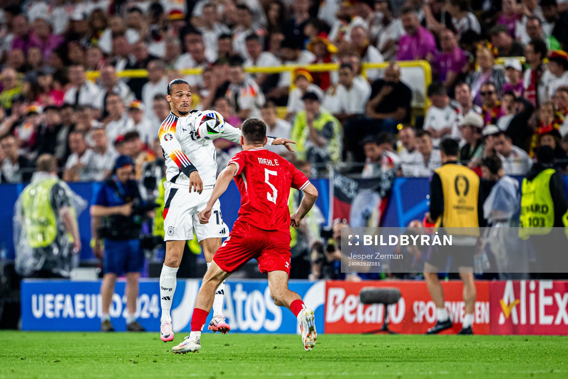 Leroy Sane of Germany and Joakim Mæhle of Denmark during the UEFA Euro 2024 Football Championship round of 16 match between Germany and Denmark on June 29, 2024 in Dortmund.