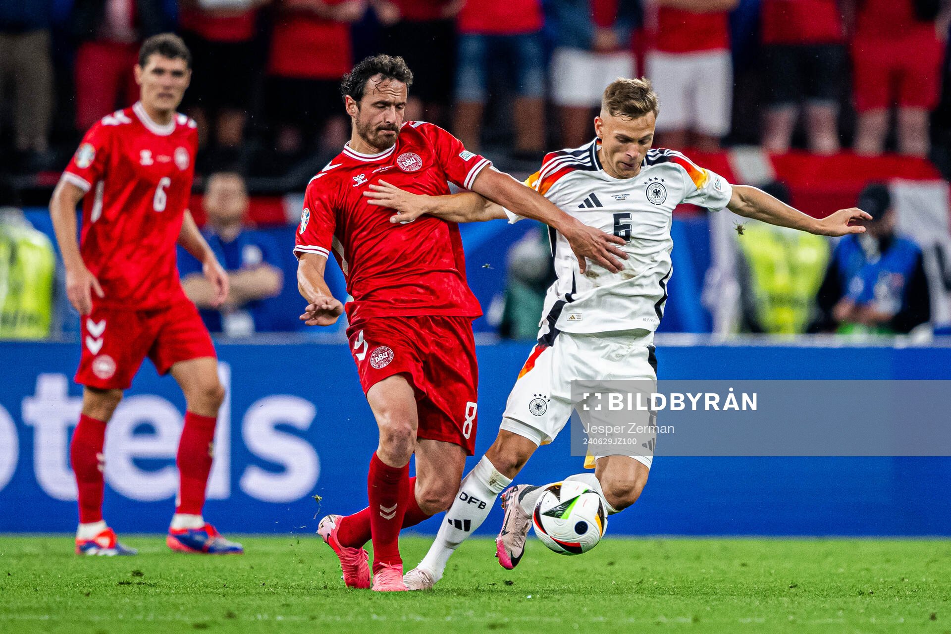 Thomas Delaney of Denmark and Joshua Kimmich of Germany