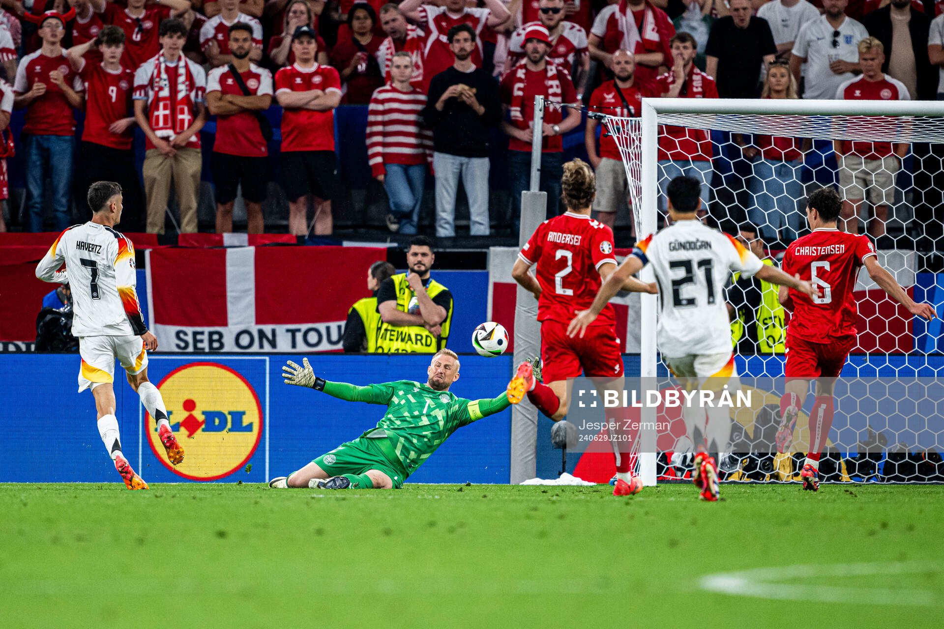 Kai Havertz of Germany and goalkeeper Kasper Schmeichel of