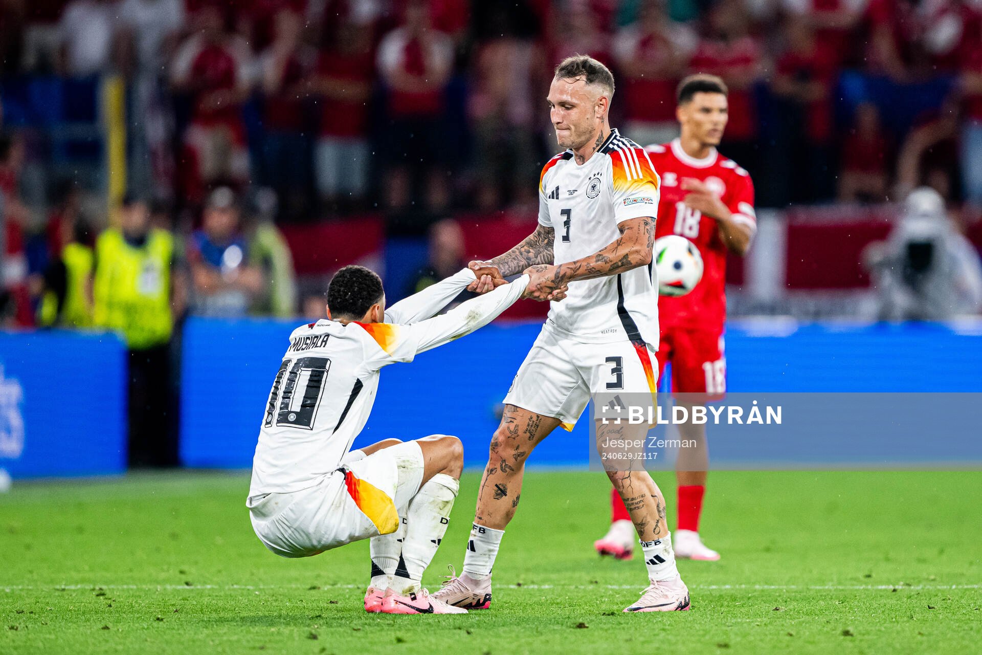 Jamal Musiala and David Raum of Germany