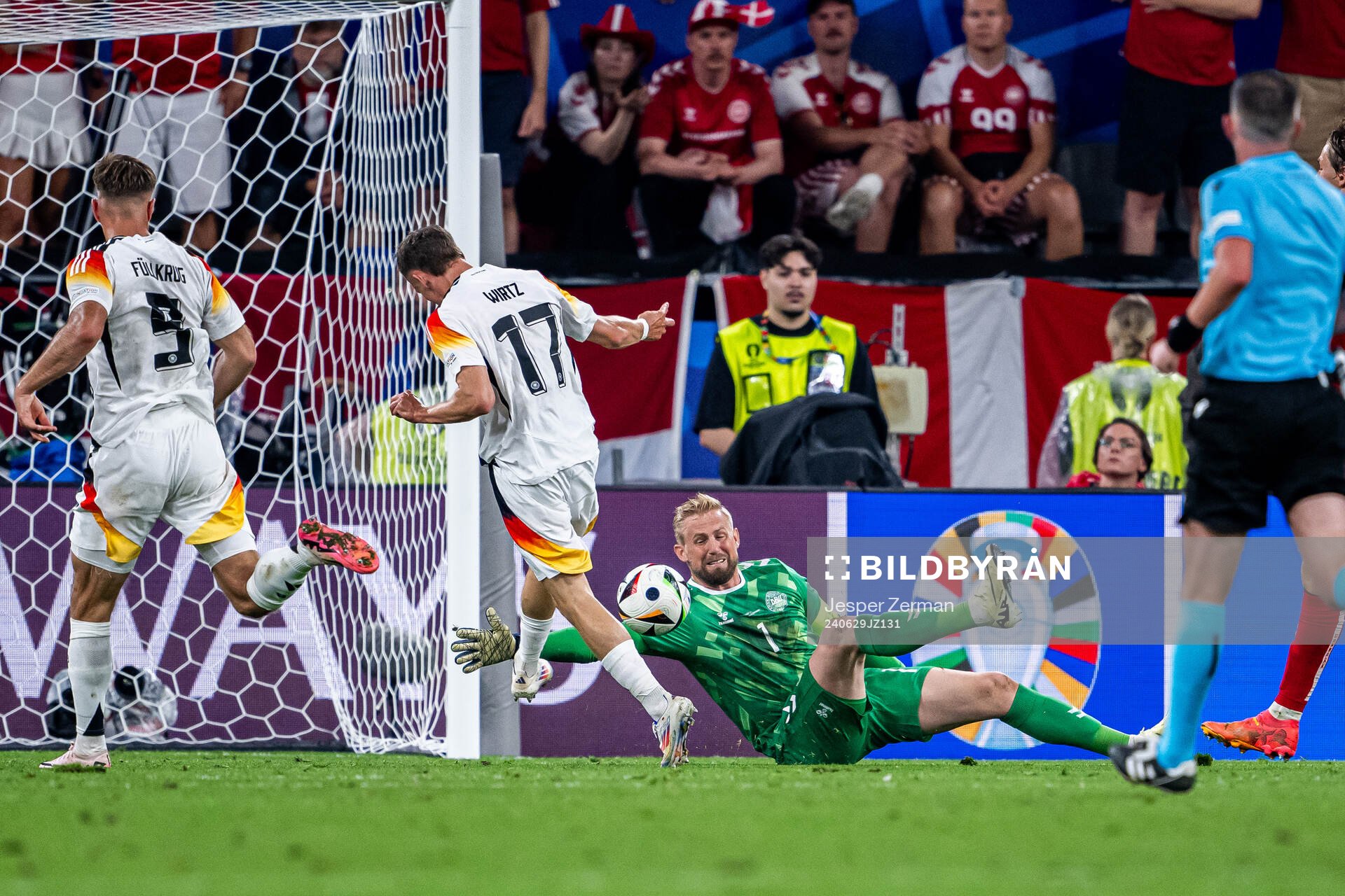 Florian Wirtz of Germany and goalkeeper Kasper Schmeichel