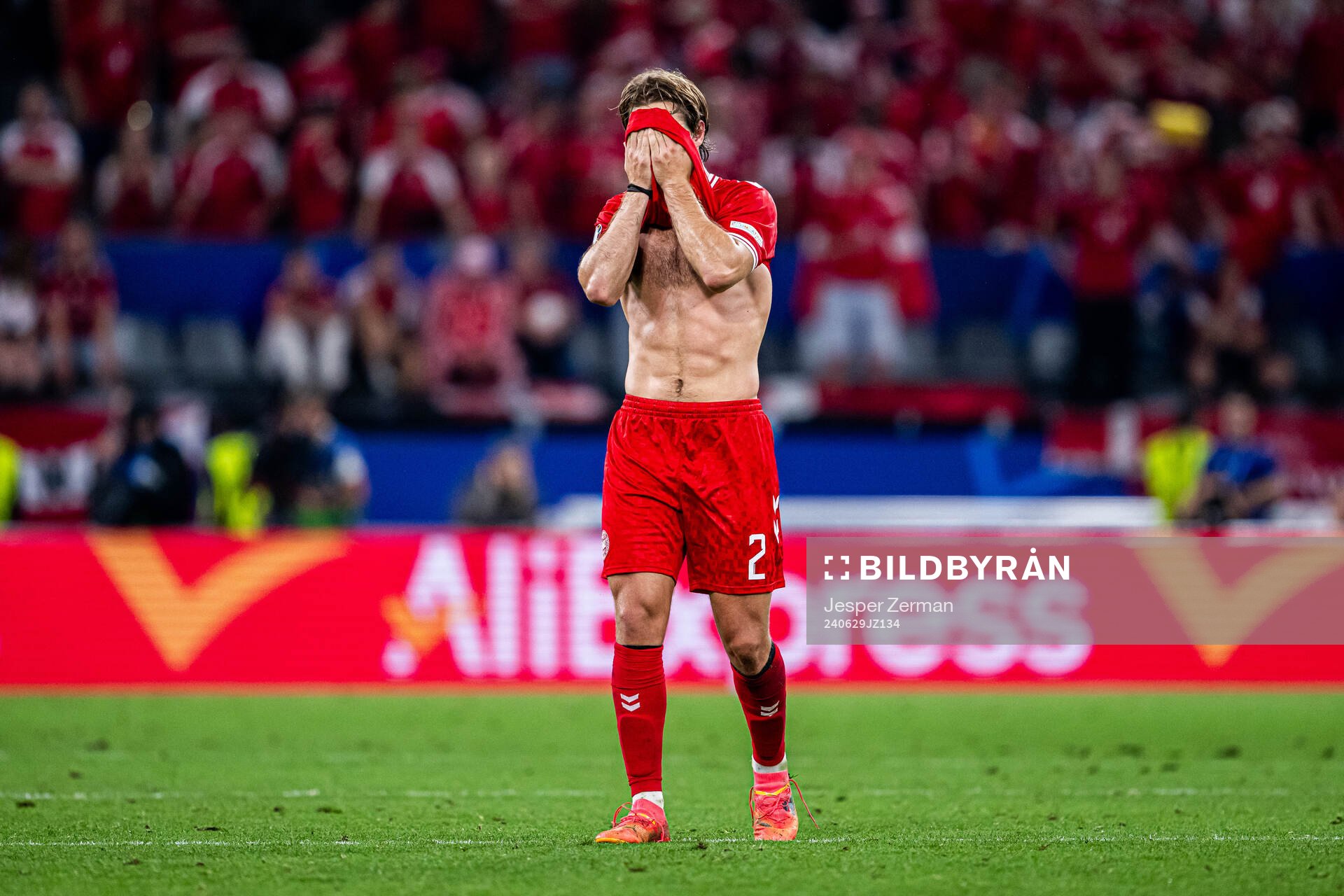 Joachim Andersen of Denmark looks dejected