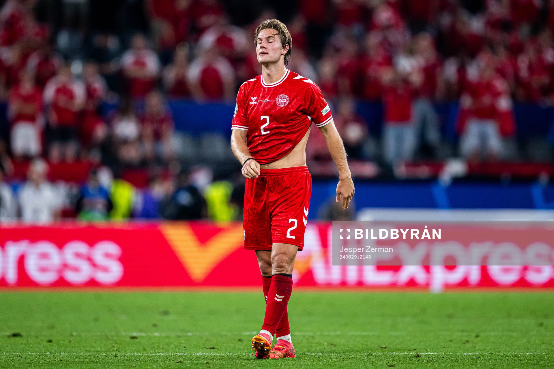 Joachim Andersen of Denmark looks dejected