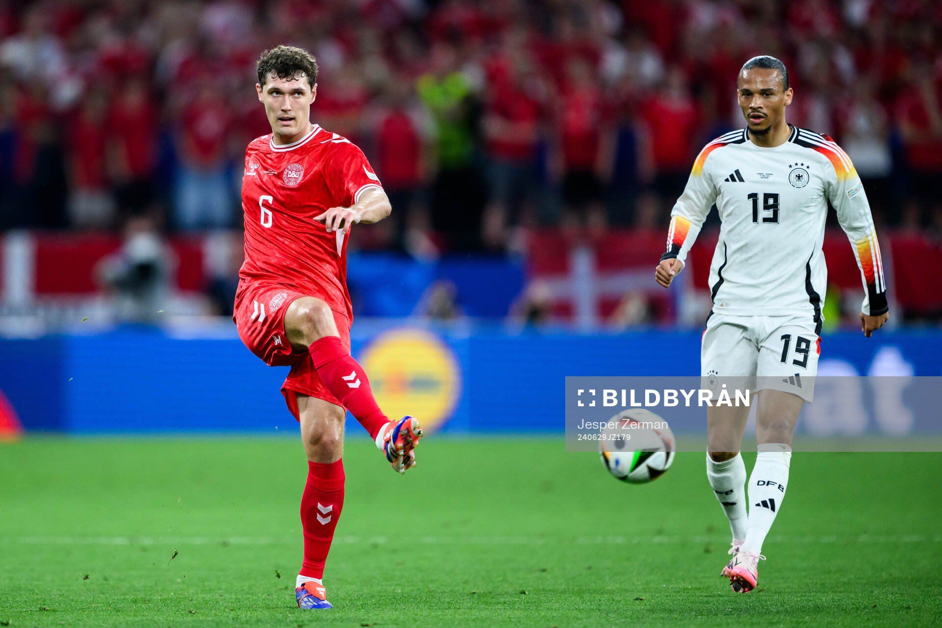 Andreas Christensen of Denmark and Leroy Sane of Germany