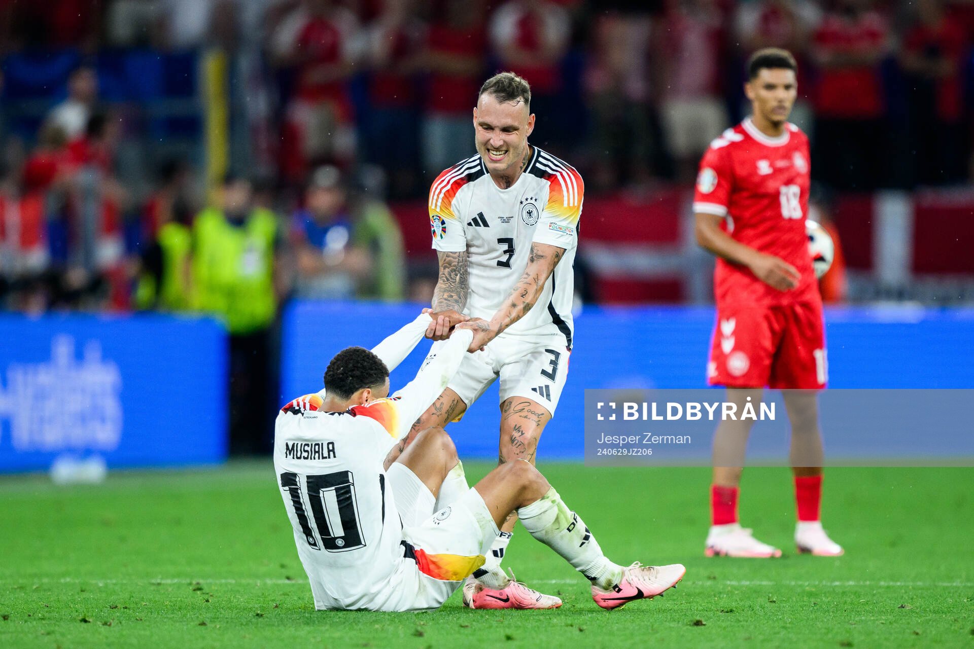 Jamal Musiala and David Raum of Germany