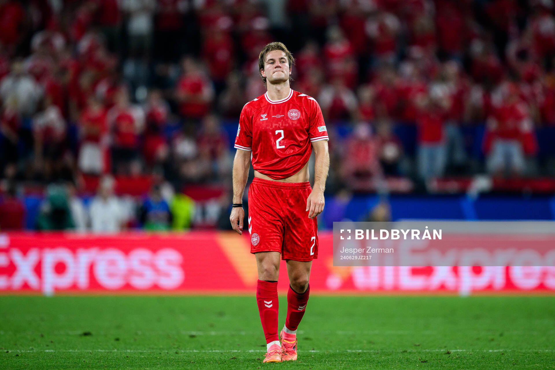 Joachim Andersen of Denmark looks dejected