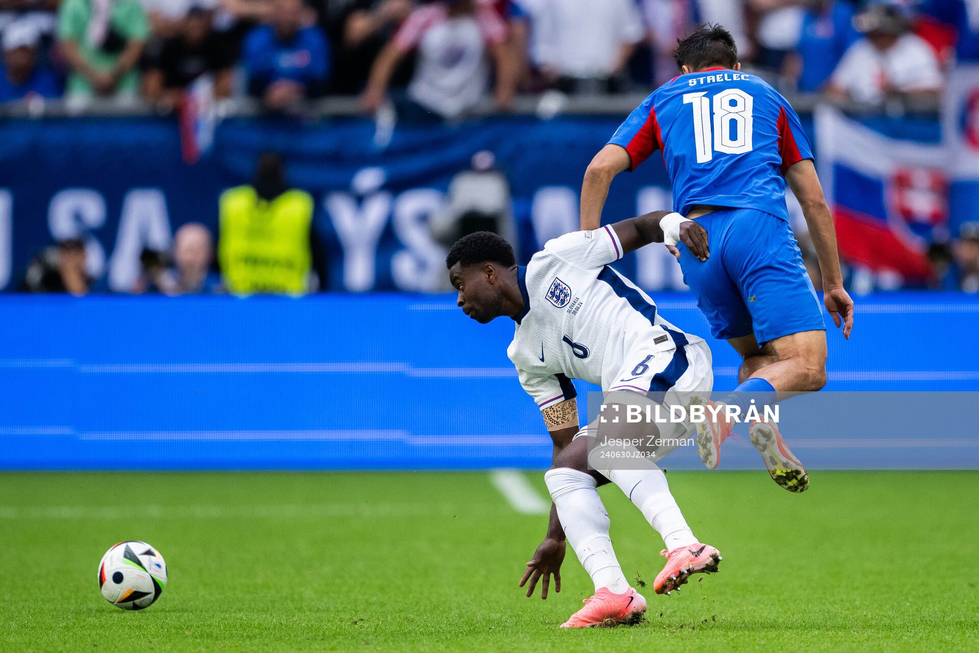 Marc Guehi of England and David Strelec of Slovakia during the UEFA Euro 2024 Football Championship round of 16 match between England and Slovakia on June 30, 2024 in Gelsenkirchen.