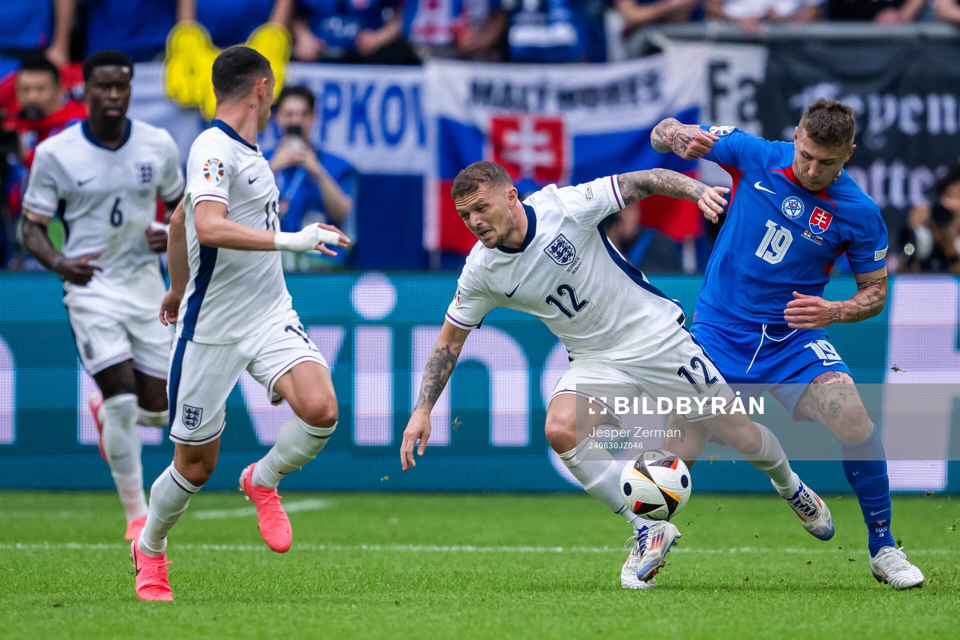 Kieran Trippier of England and Juraj Kucka of Slovakia