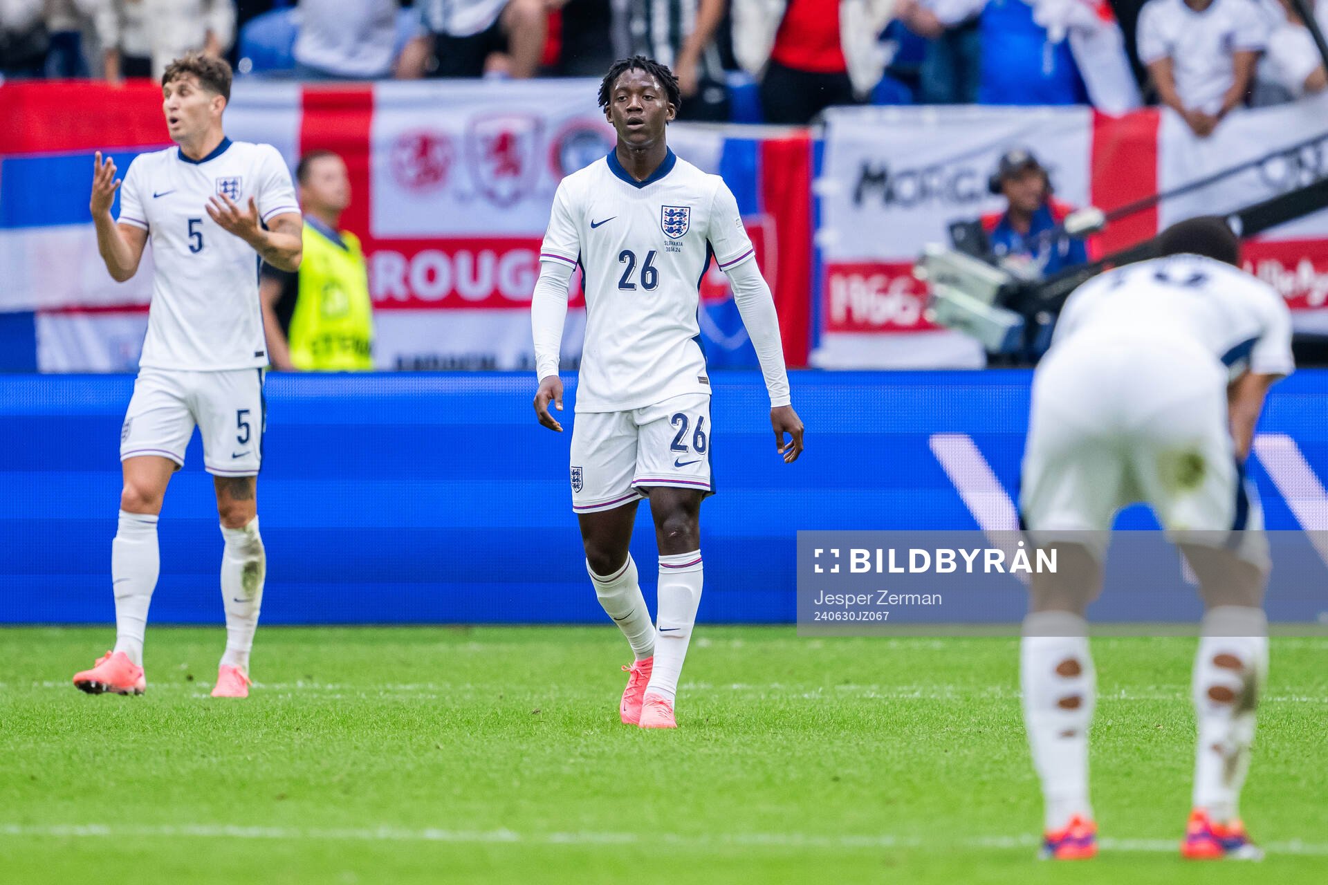 John Stones and Kobbie Mainoo of England look dejected