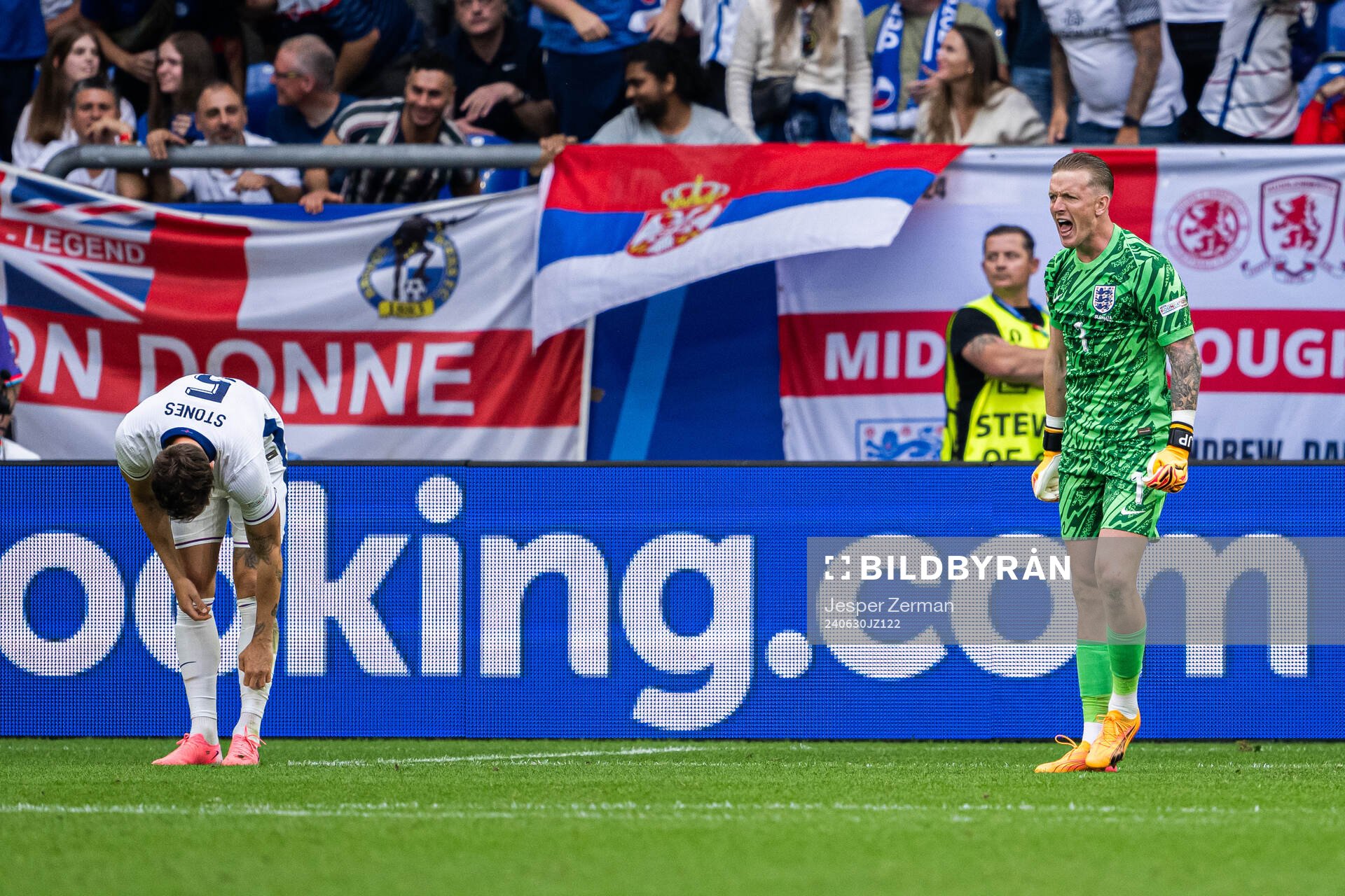 Goalkeeper Jordan Pickford of England reacts