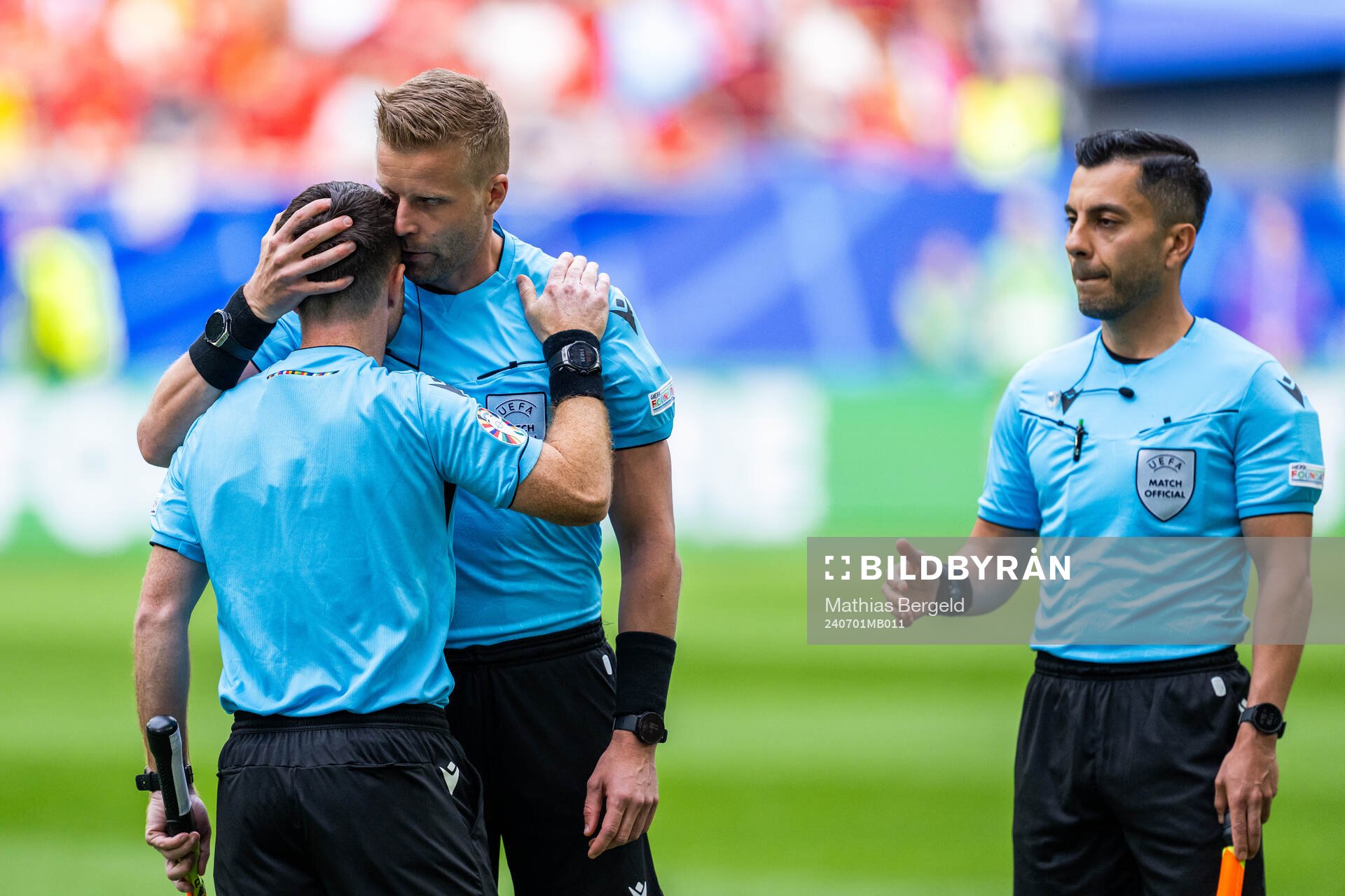 Referee Glenn Nyberg along with assistant referees Mahbod