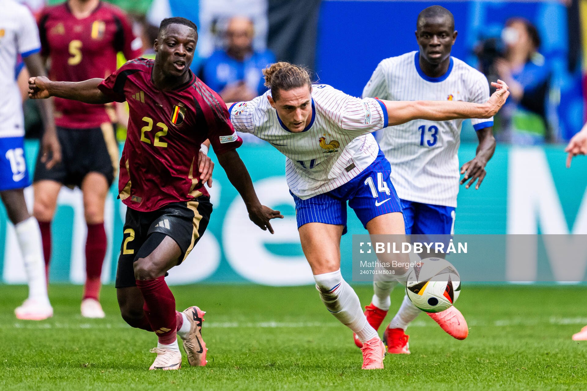 Jeremy Doku of Belgium and Adrien Rabiot of France
