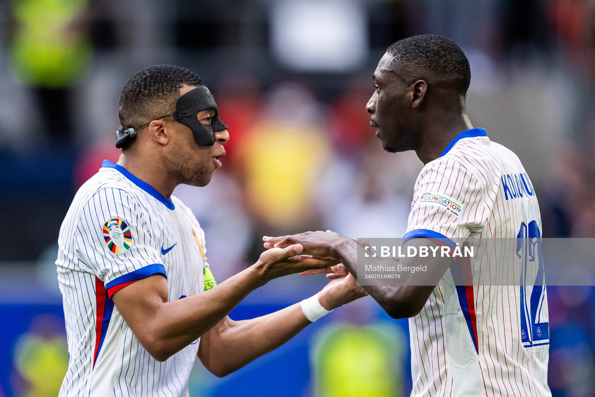 Kylian Mbappé and Randal Kolo Muani of France celebrate