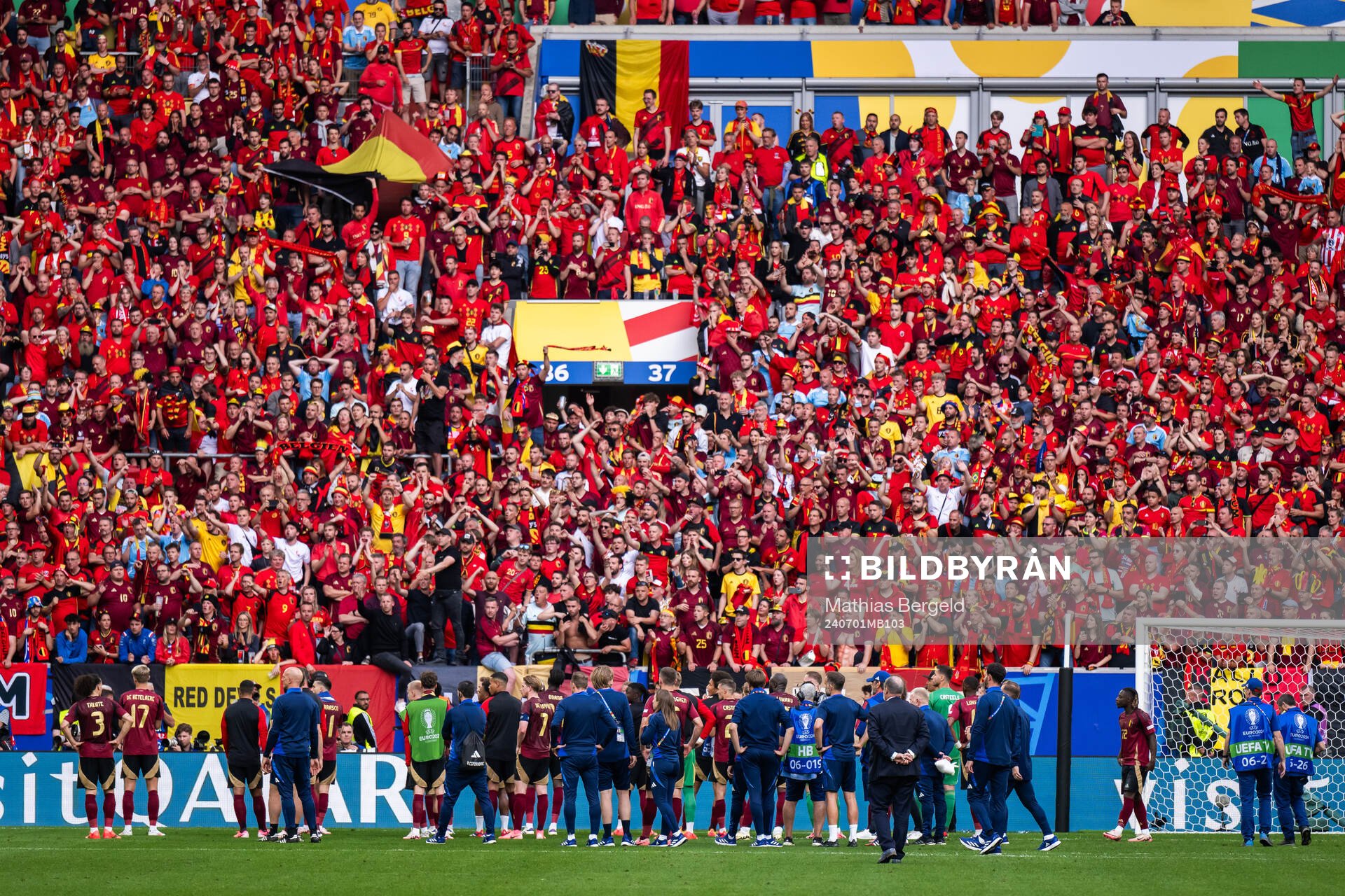 Players of Belgium with their supporters