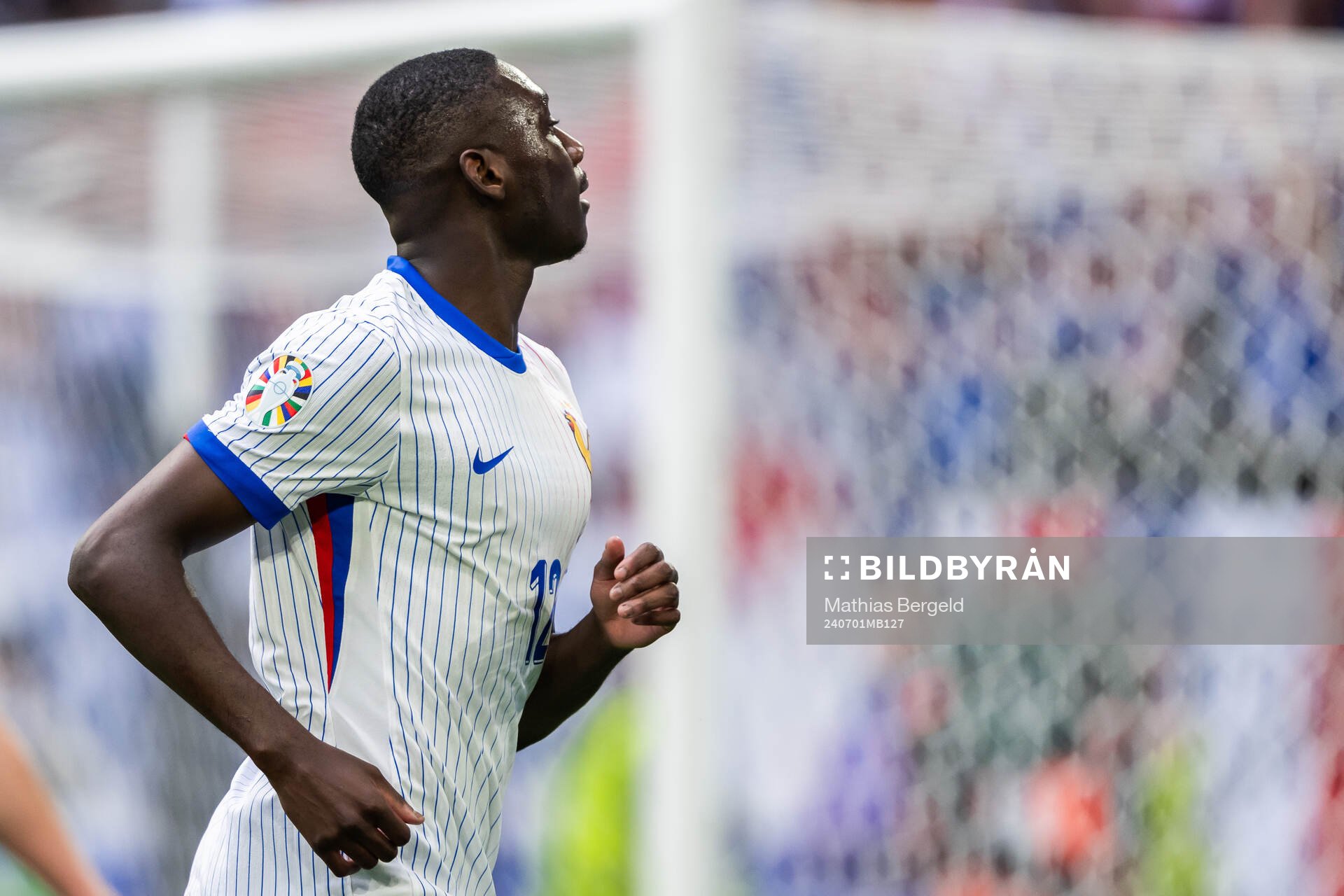 Randal Kolo Muani of France celebrates