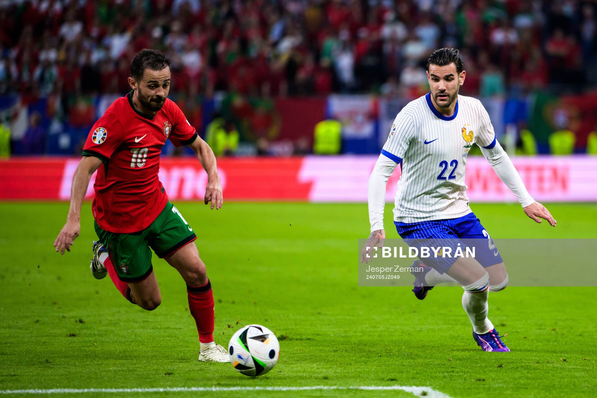 Bernardo Silva of Portugal and Theo Hernandez of France