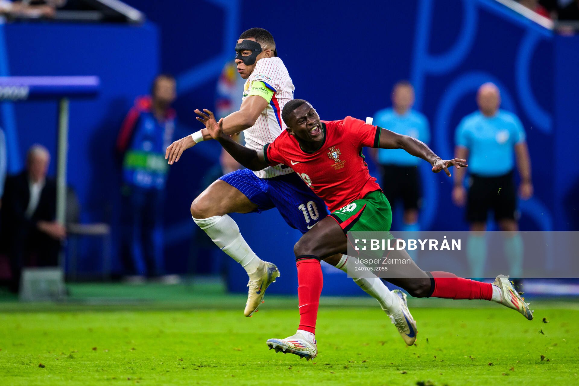 Kylian Mbappé of France and Nuno Mendes of Portugal during the UEFA Euro 2024 Football Championship Quarterfinal between Portugal and France on July 5, 2024 in Hamburg.