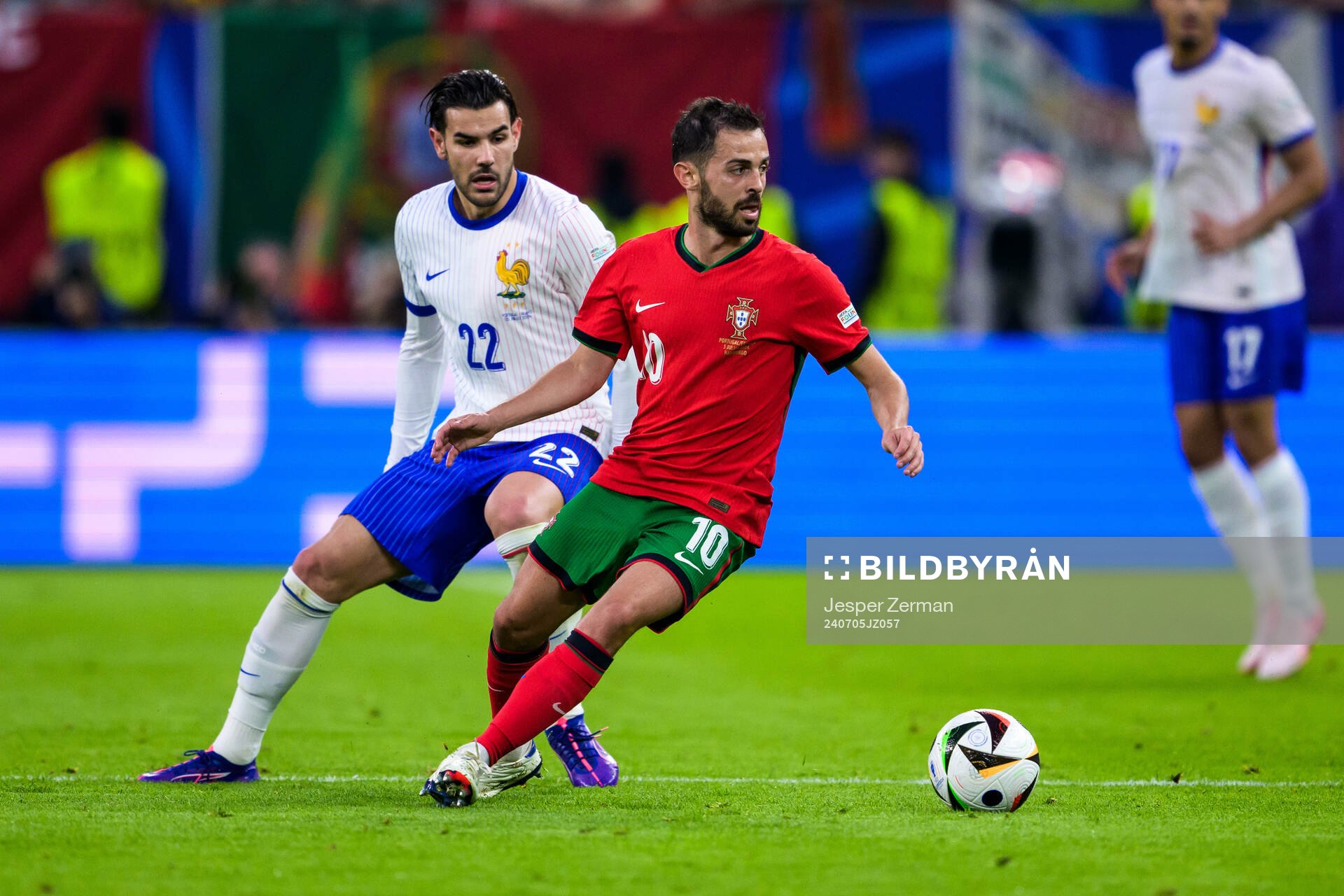 Theo Hernandez of France and Bernardo Silva of Portugal
