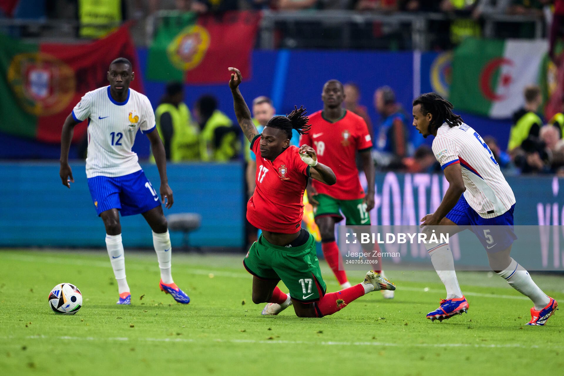 Rafael Leao of Portugal and Jules Koundé of France