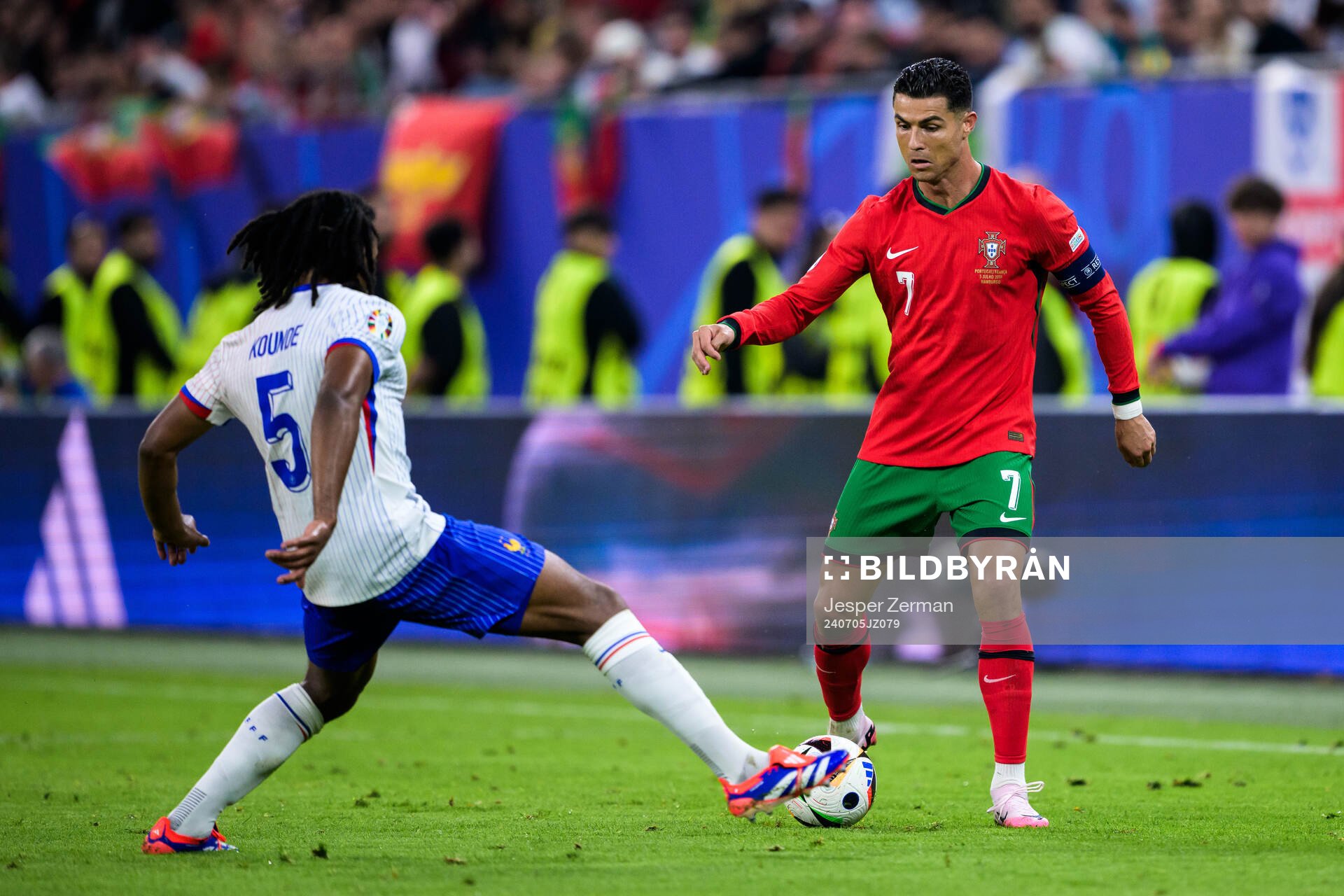 Marcus Thuram of France and Cristiano Ronaldo of Portugal