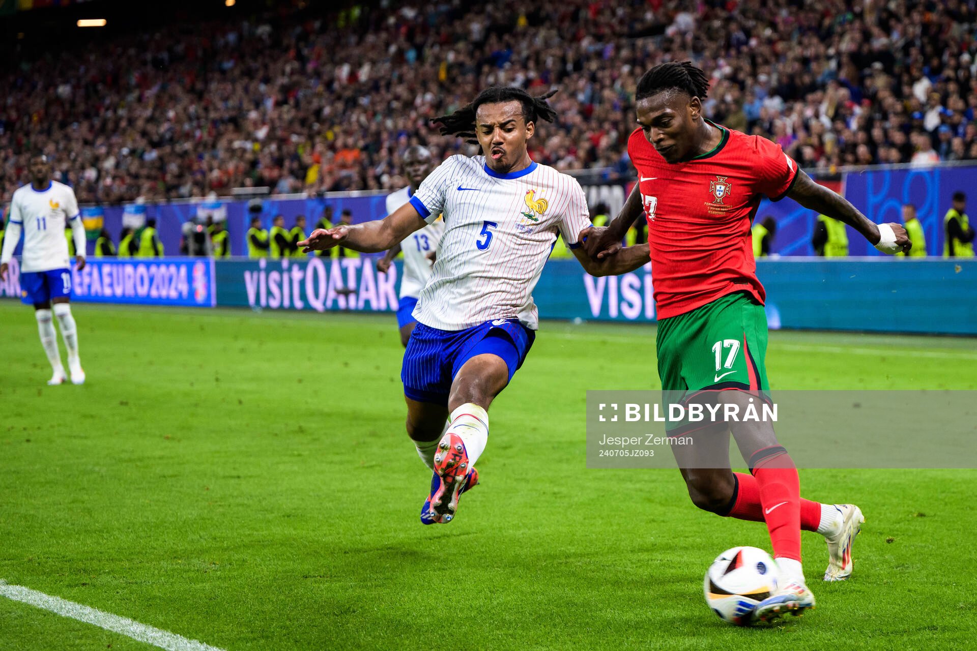 Jules Koundé of France and Rafael Leao of Portugal
