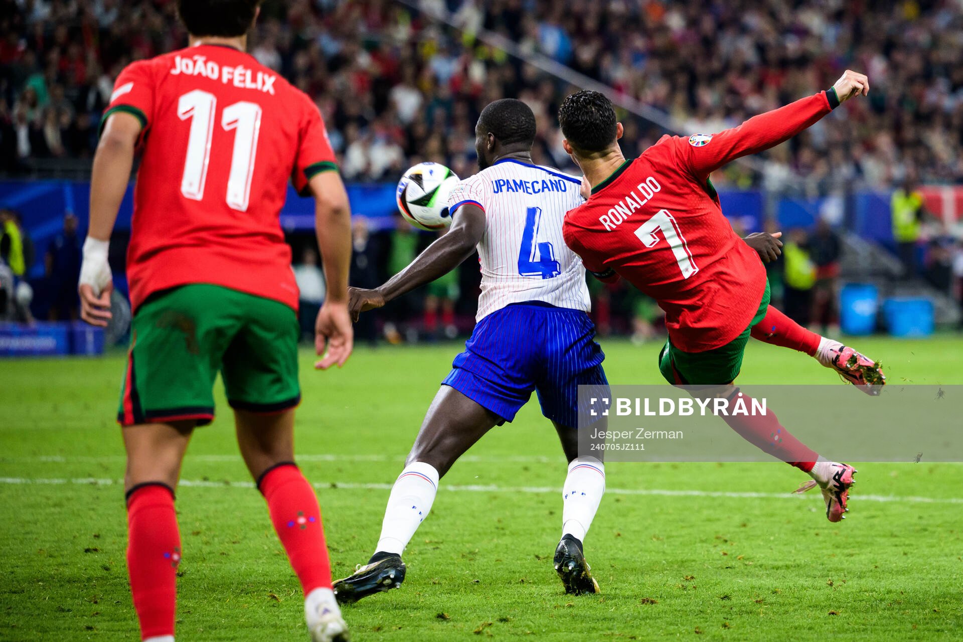 Dayot Upamecano of France and Cristiano Ronaldo of Portugal