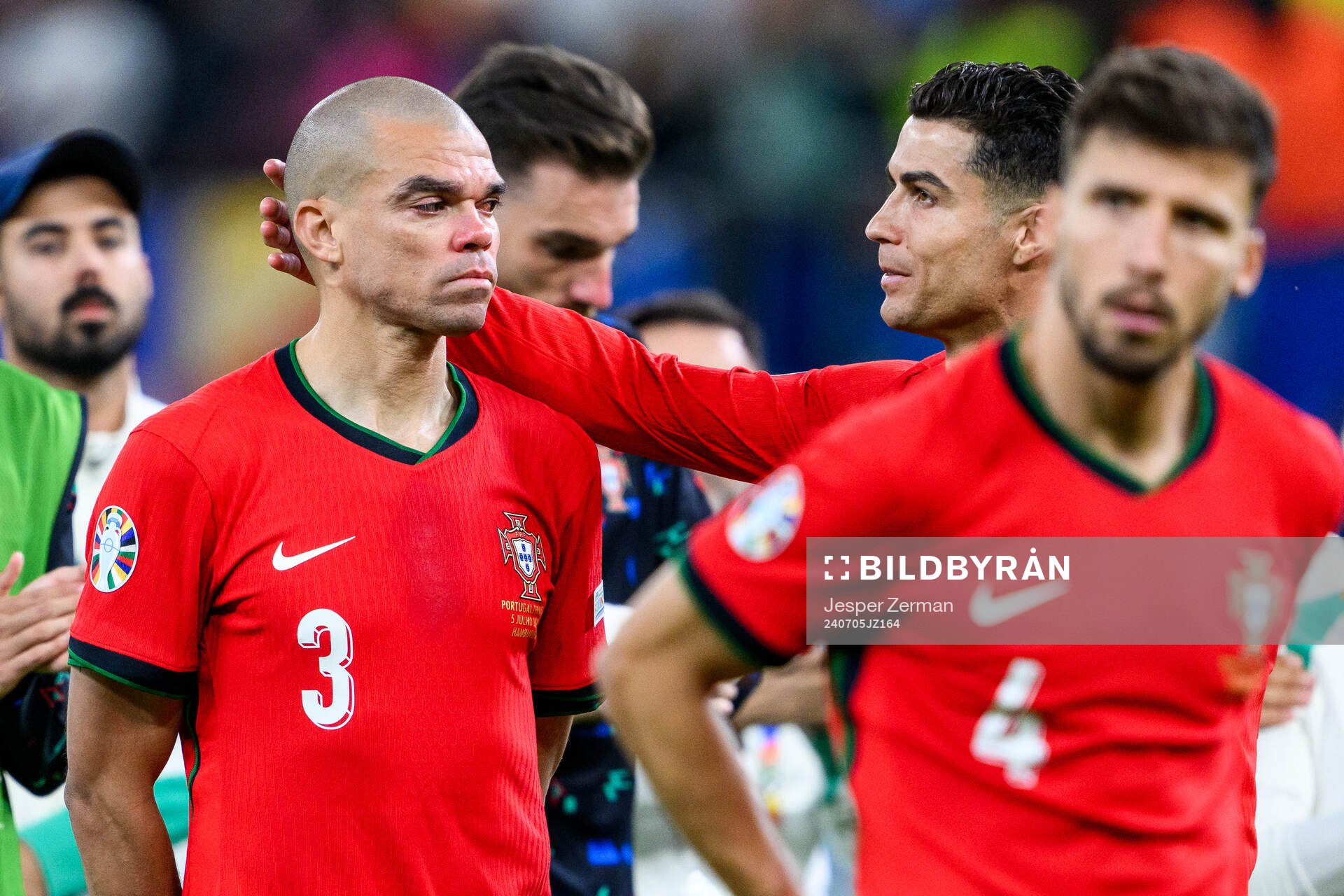 Pepe and Cristiano Ronaldo of Portugal look dejected