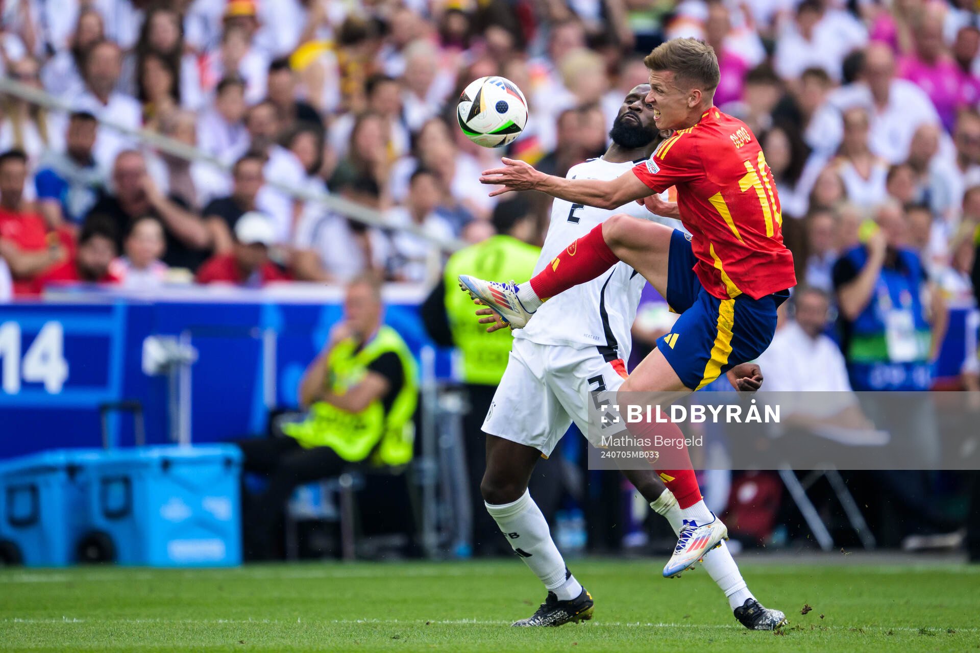 Antonio Ruediger of Germany and Daniel Olmo of Spain