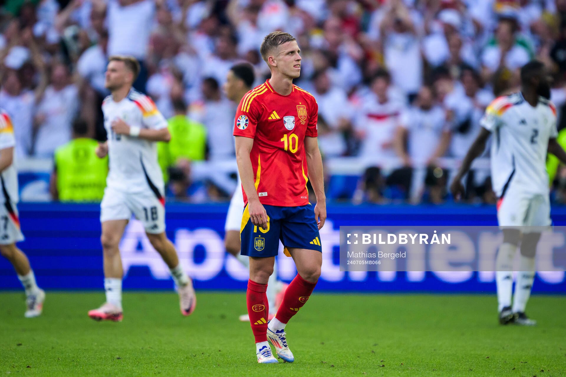 Daniel Olmo of Spain looks dejected