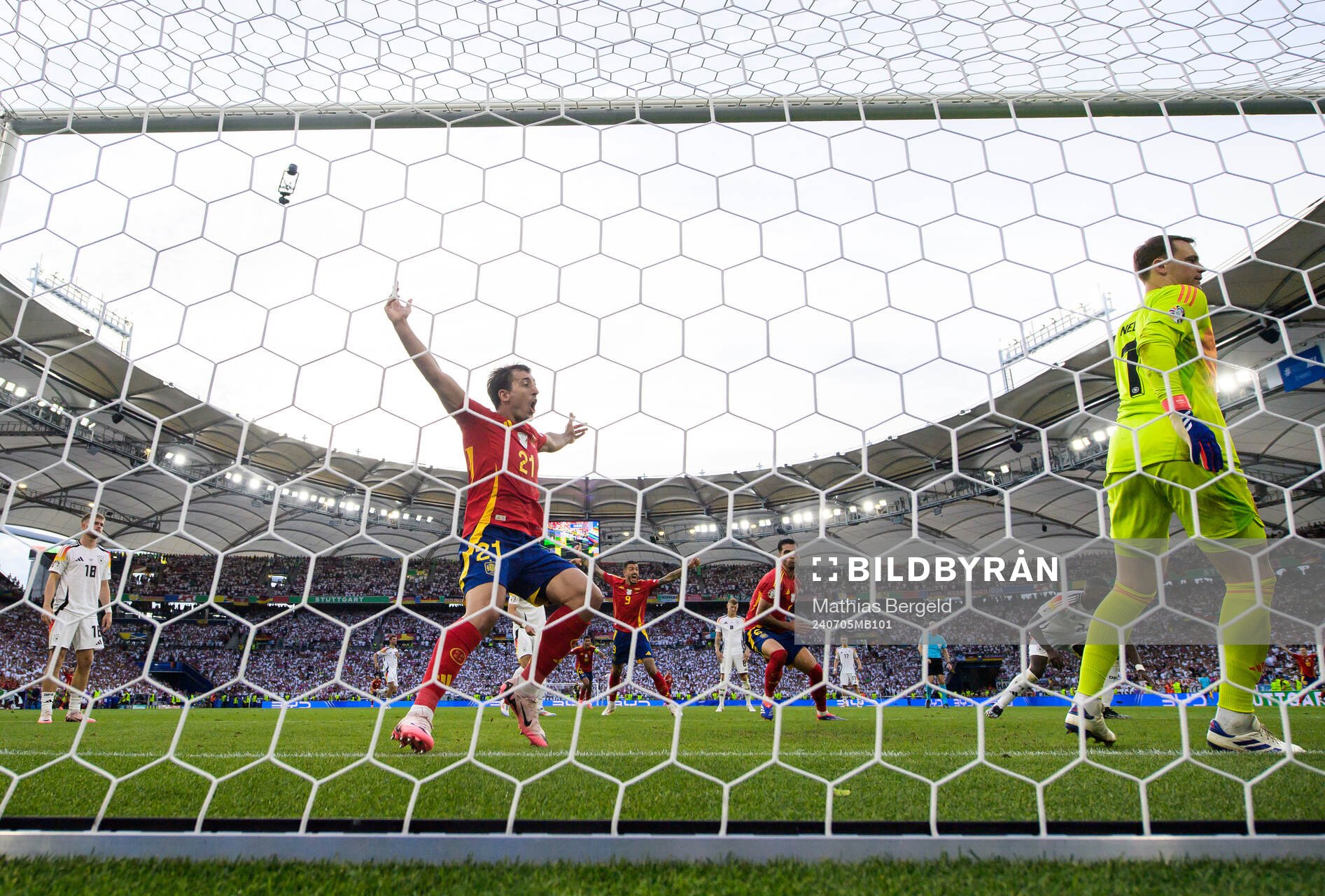 Mikel Oyarzabal of Spain celebrates and Manuel Neuer of