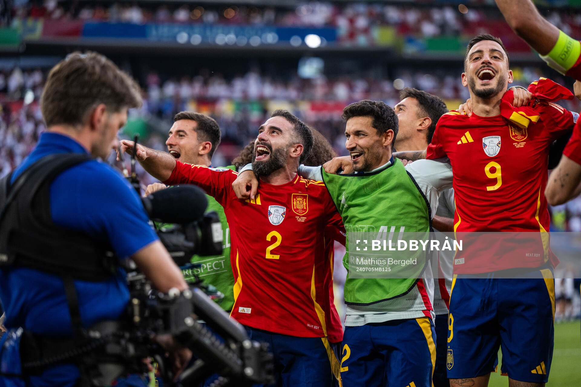 Daniel Carvajal and Joselu of Spain celebrate
