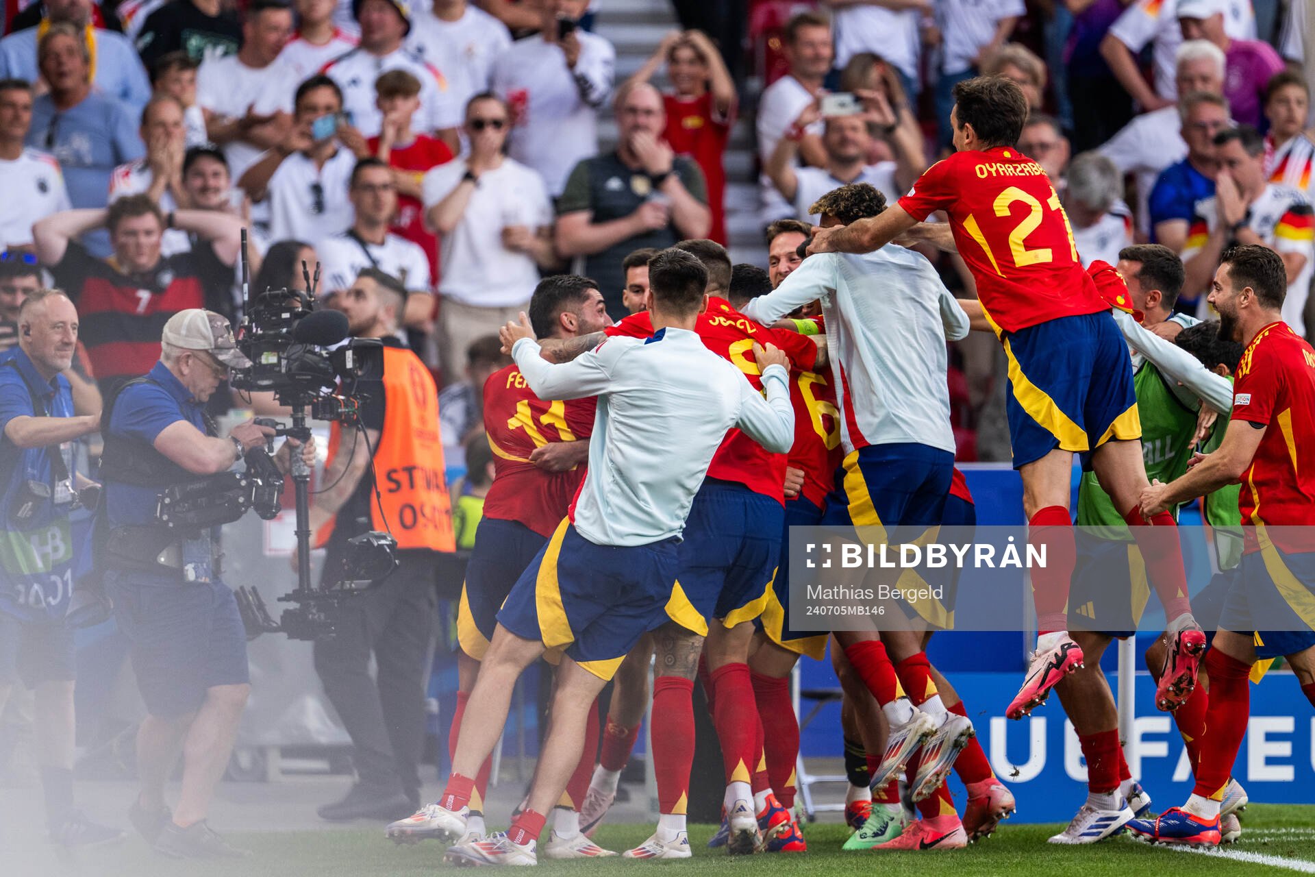 Mikel Merino of Spain celebrates with team mates
