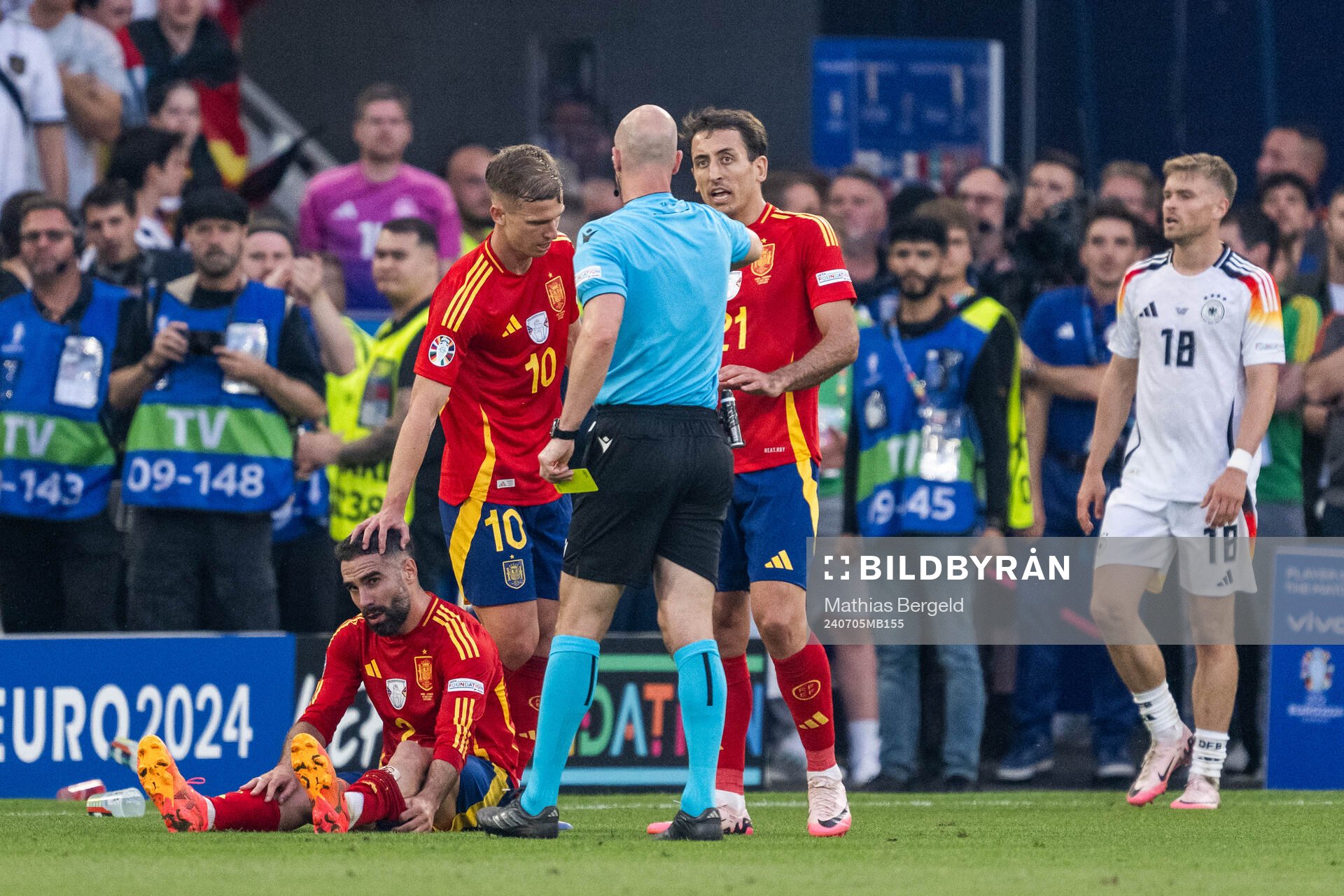 Daniel Carvajal of Spain looks dejected as he receives a