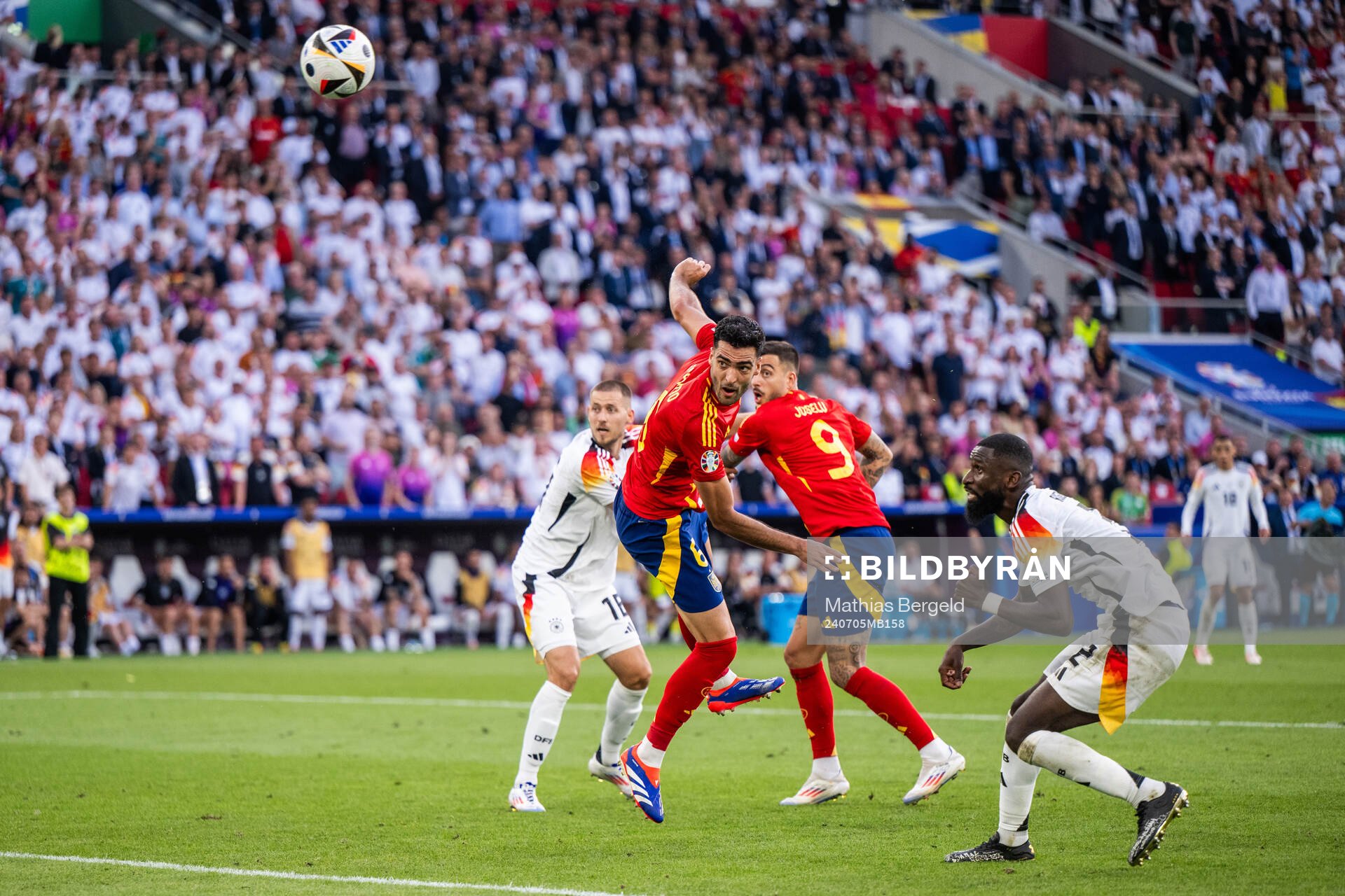 Antonio Rüdiger of Germany sees Mikel Merino of Spain
