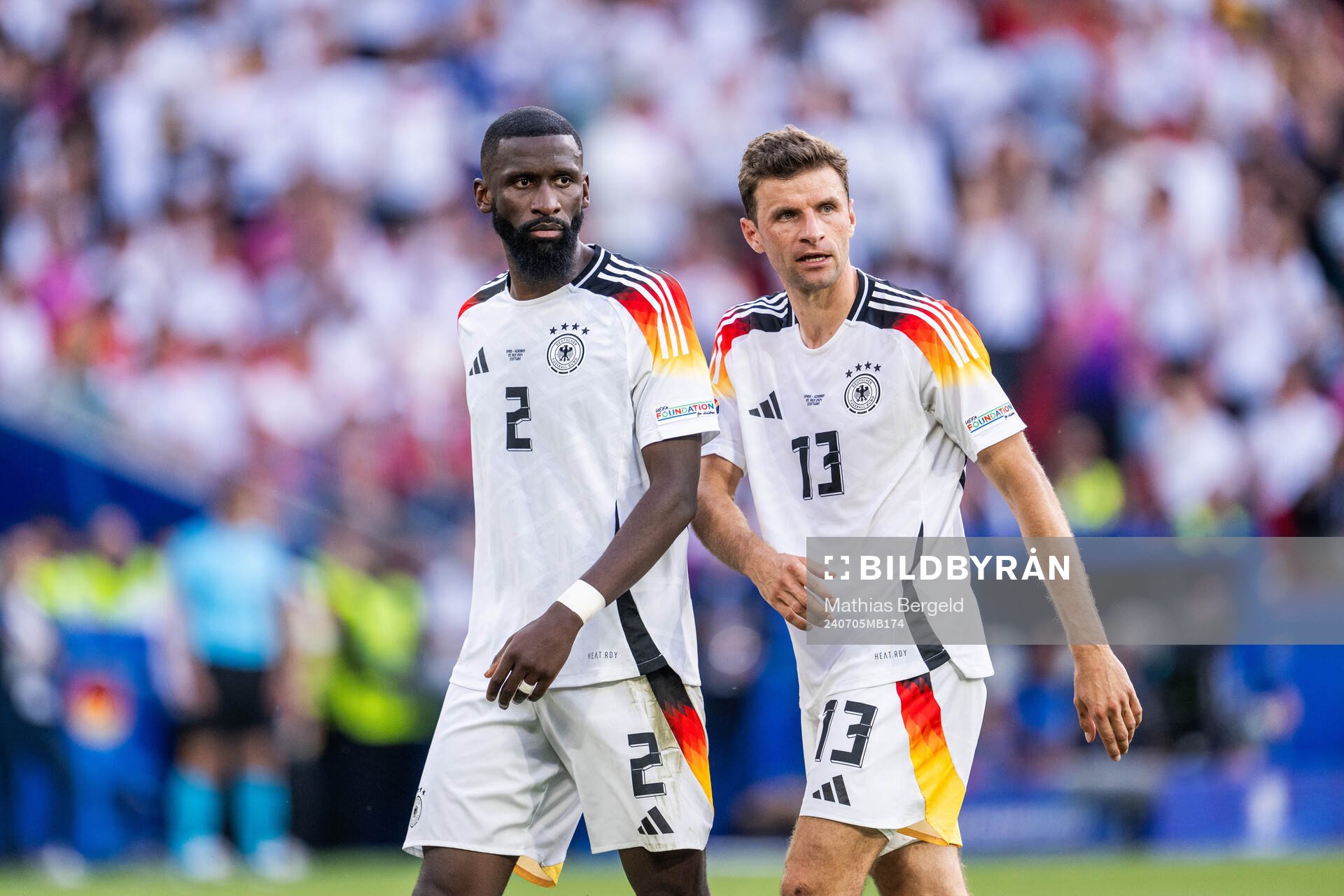 Antonio Rüdiger and Thomas Müller of Germany