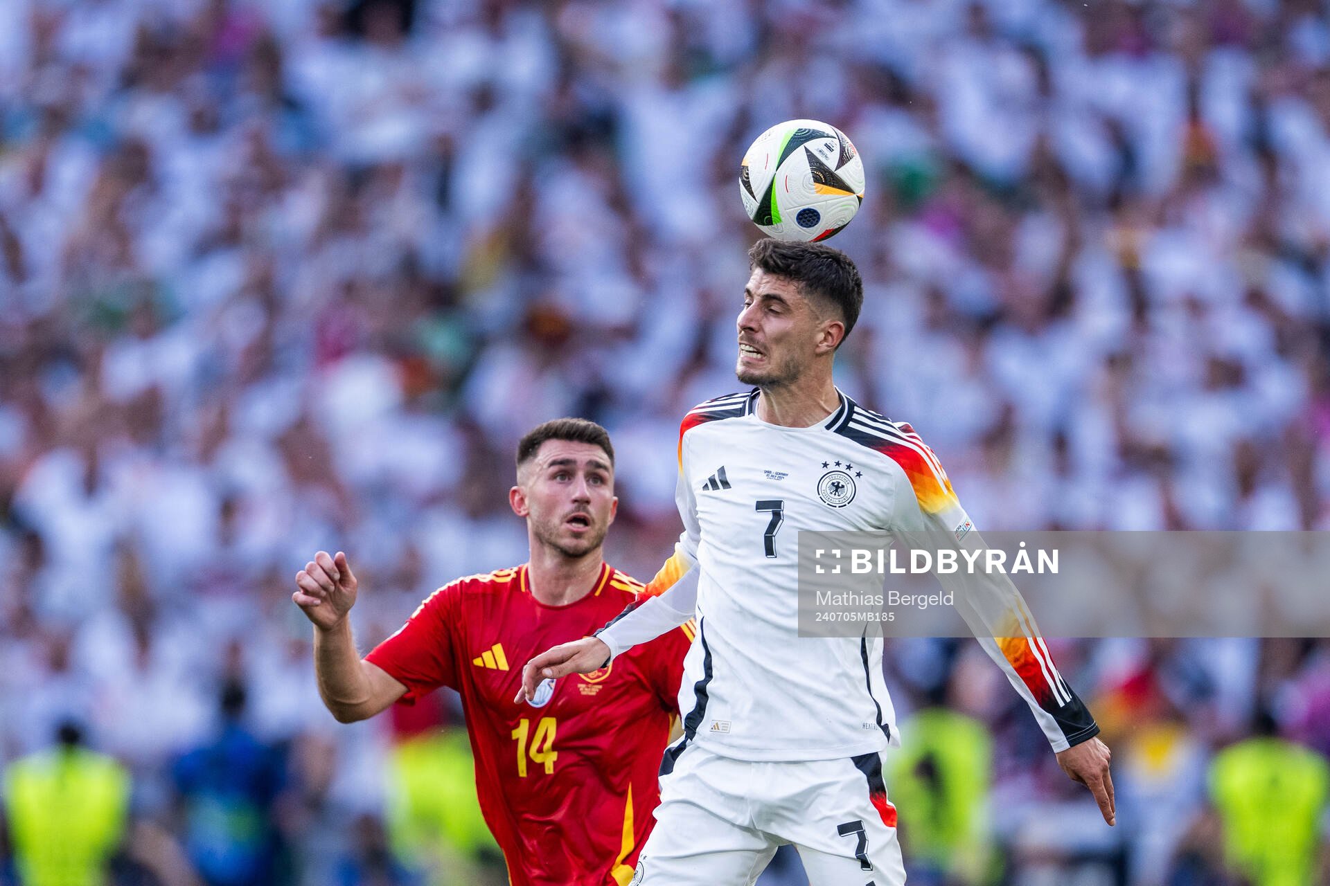 Aymeric Laporte of Spain and Kai Havertz of Germany