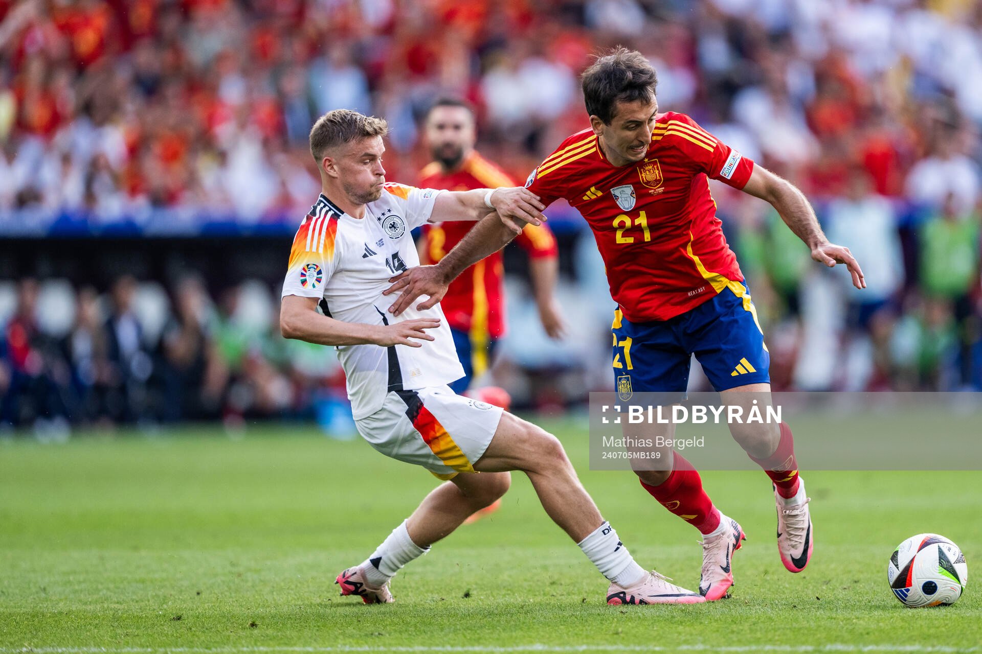 Joshua Kimmich of Germany and Mikel Oyarzabal of Spain