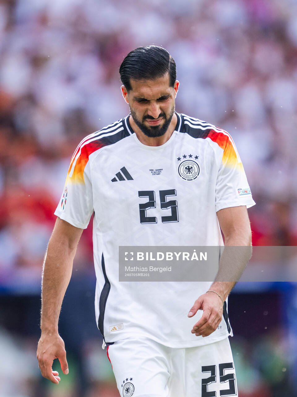 Emre Can of Germany looks dejected