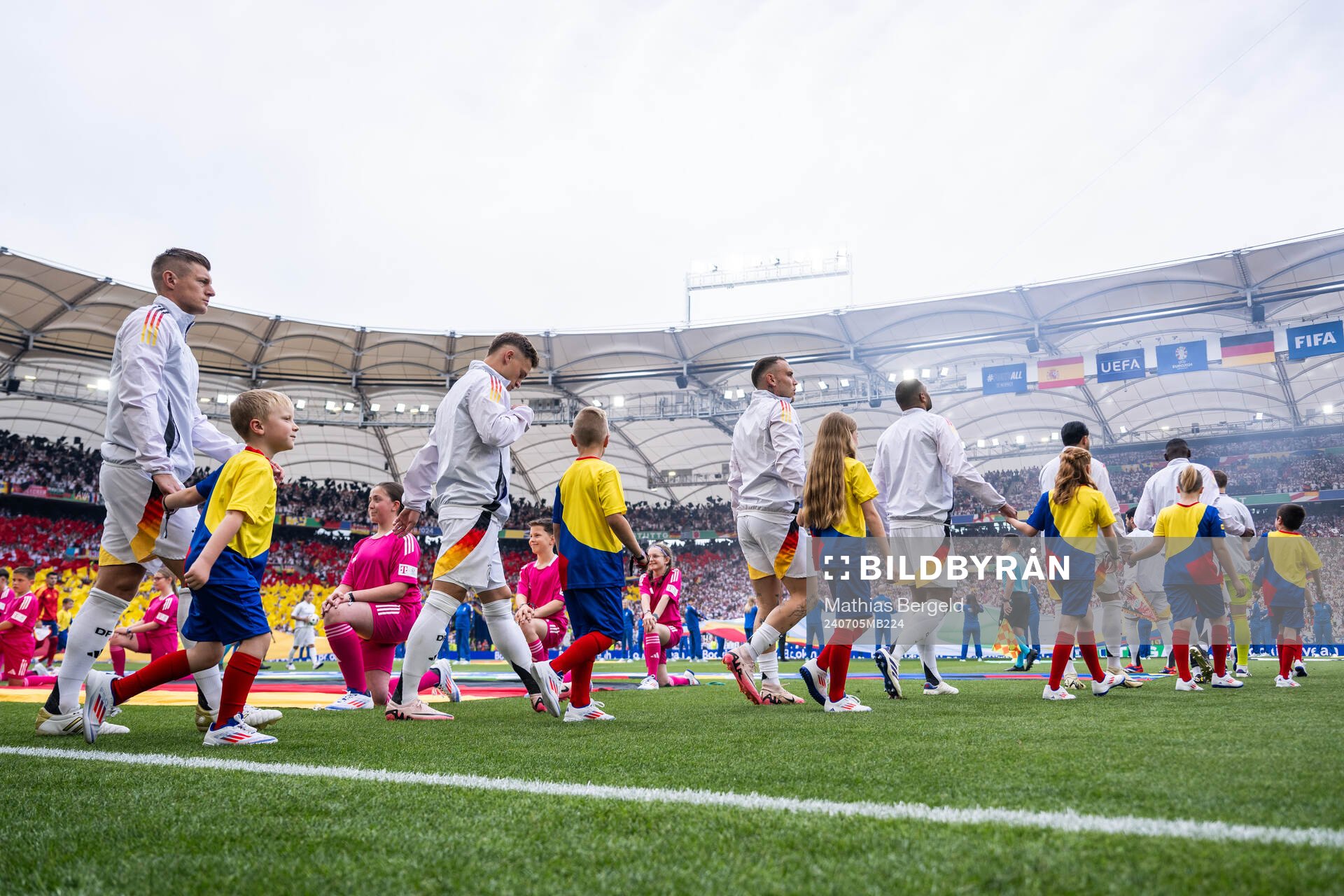 Toni Kroos and Joshua Kimmich of Germany enter the pitch